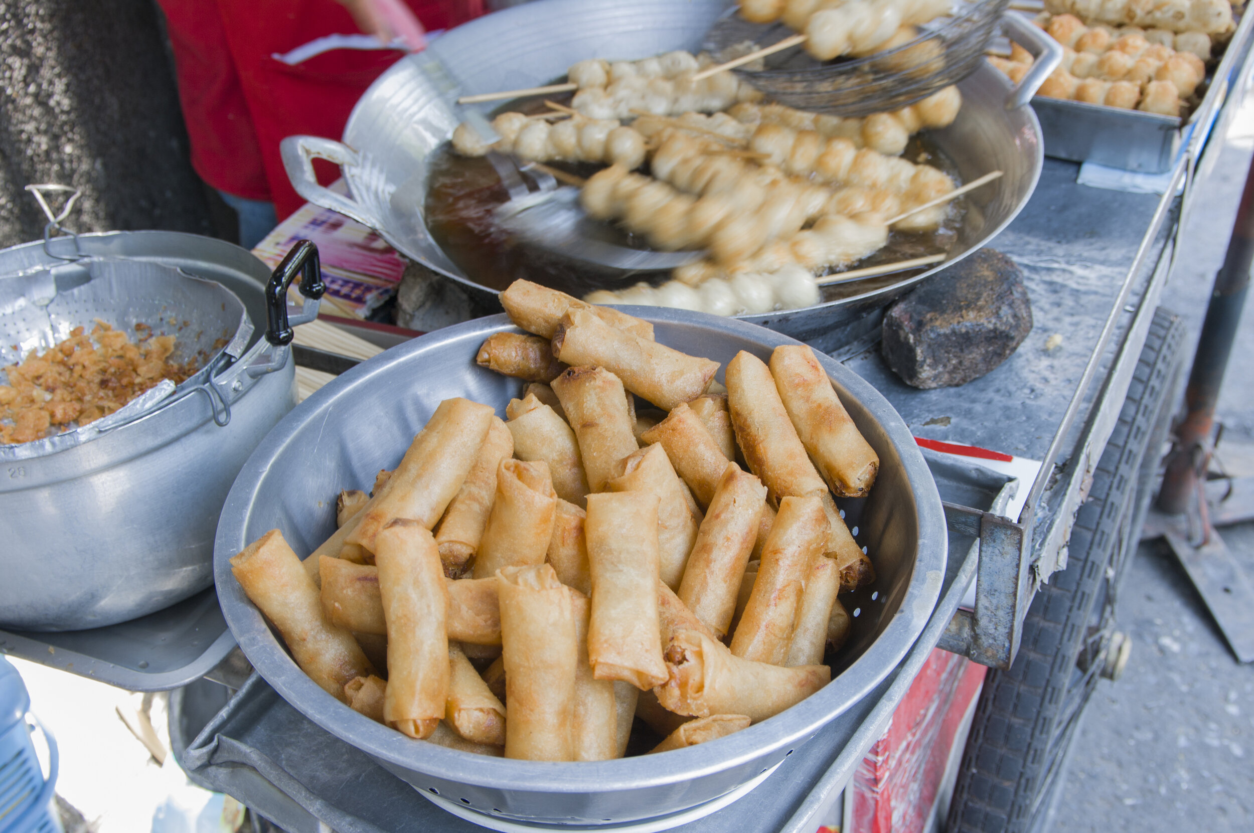 Spring rolls are a tasty Thai street food.