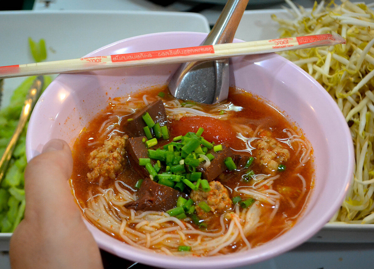 Khanom Jeen Nam Ngiao, a popular street food in Chiang Mai.