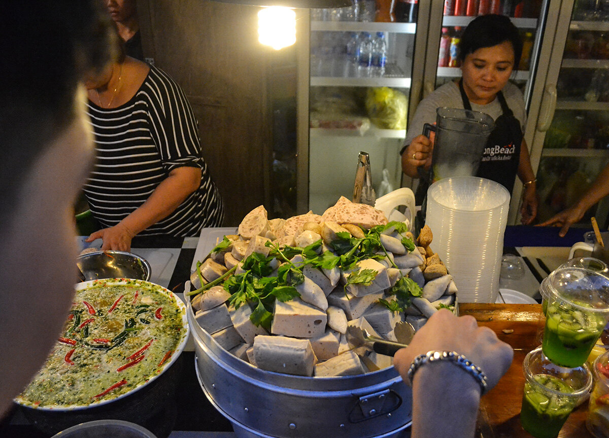 Sausages are common street foods in Chiang Mai.