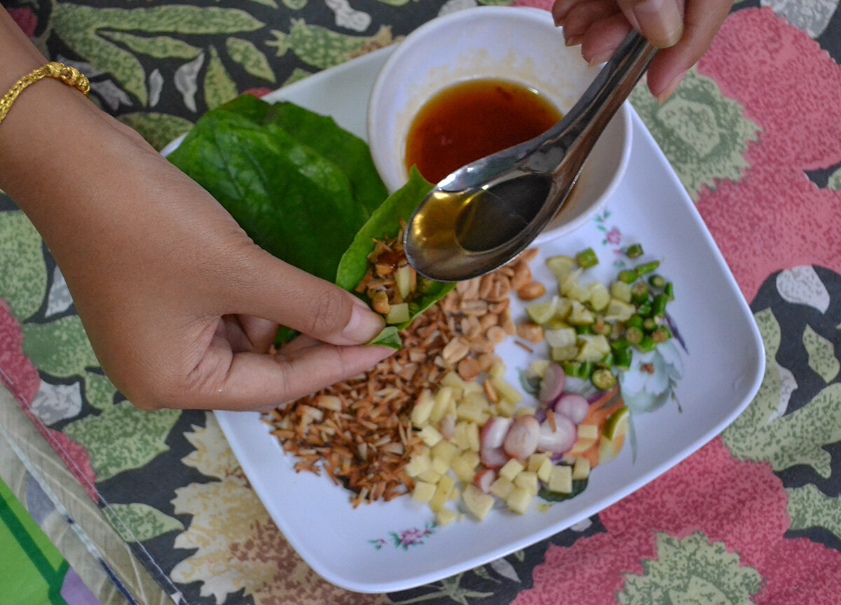 Thai street food in Chiang Mai, Miang Kham wraps.