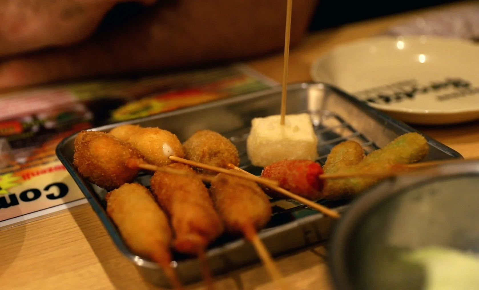 A popular Japanese food in Osaka, Kushikatsu, is a combination of fried meats and vegetables.