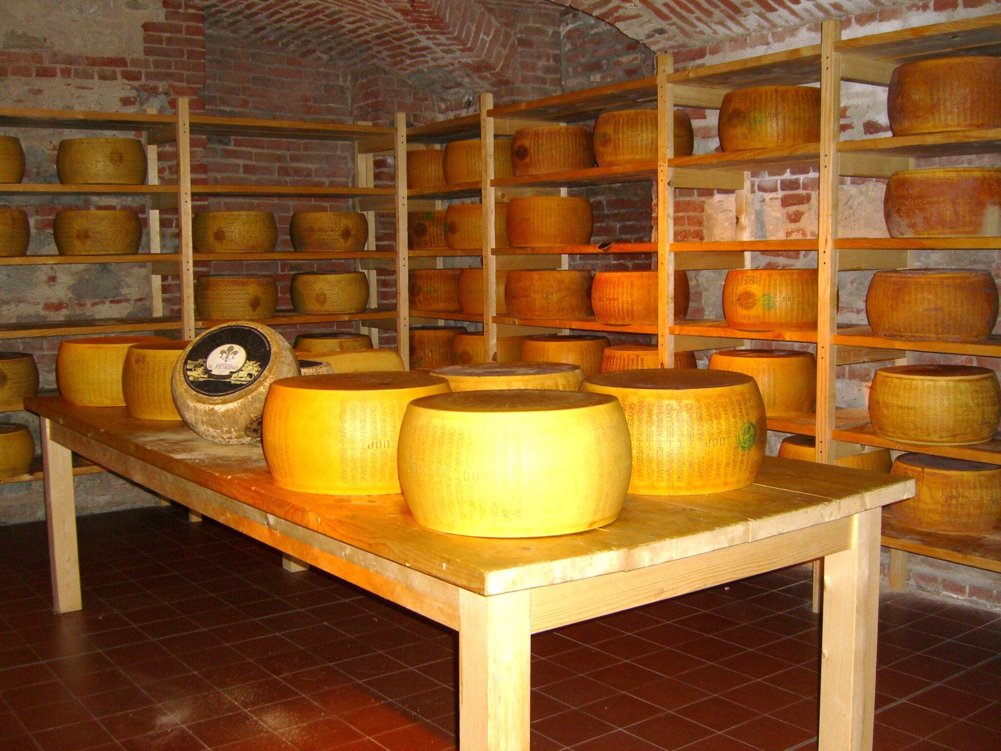 Wheels of Parmigiano Reggiano, one of the most famous food products from Italy.