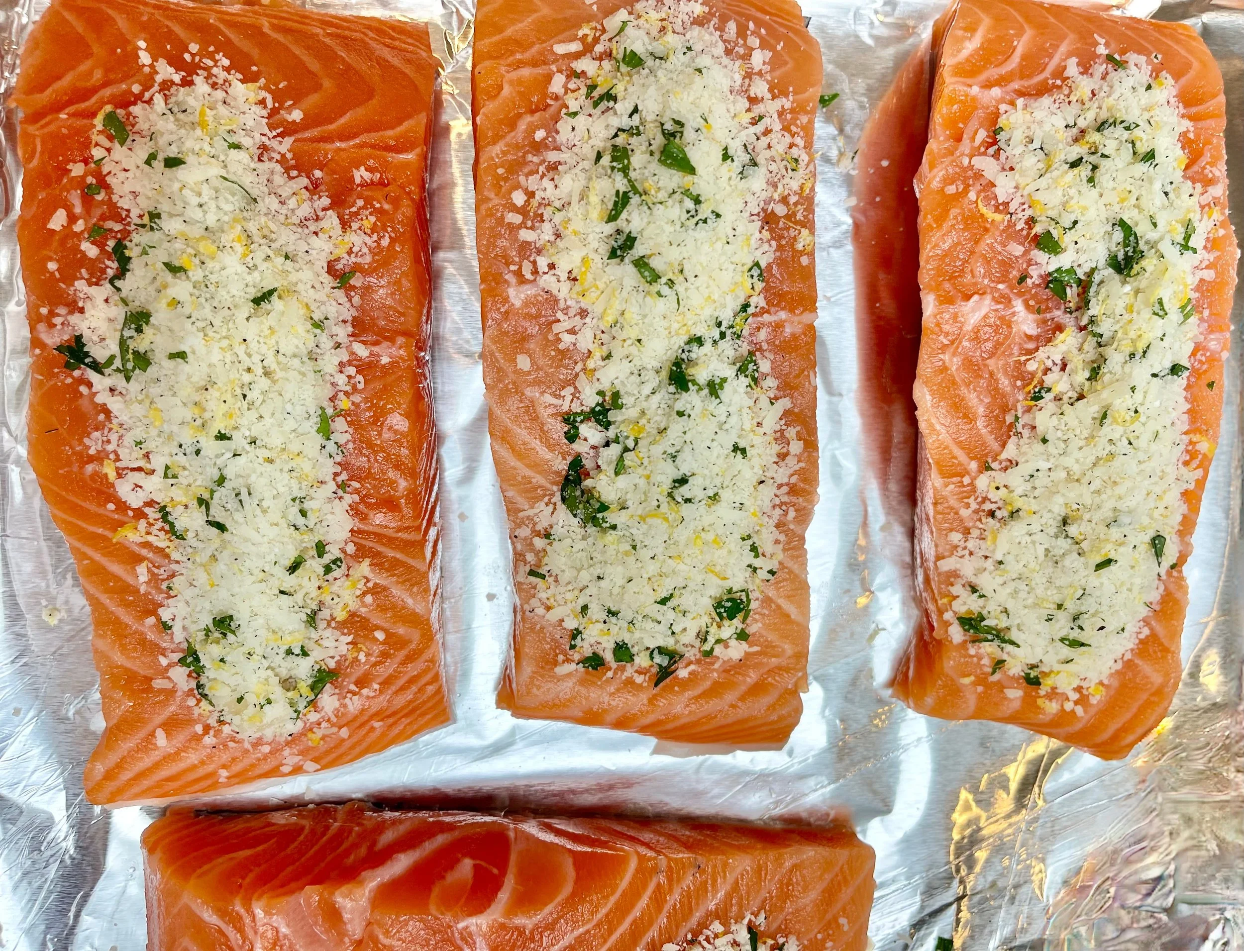 Topping the salmon with parmesan crust