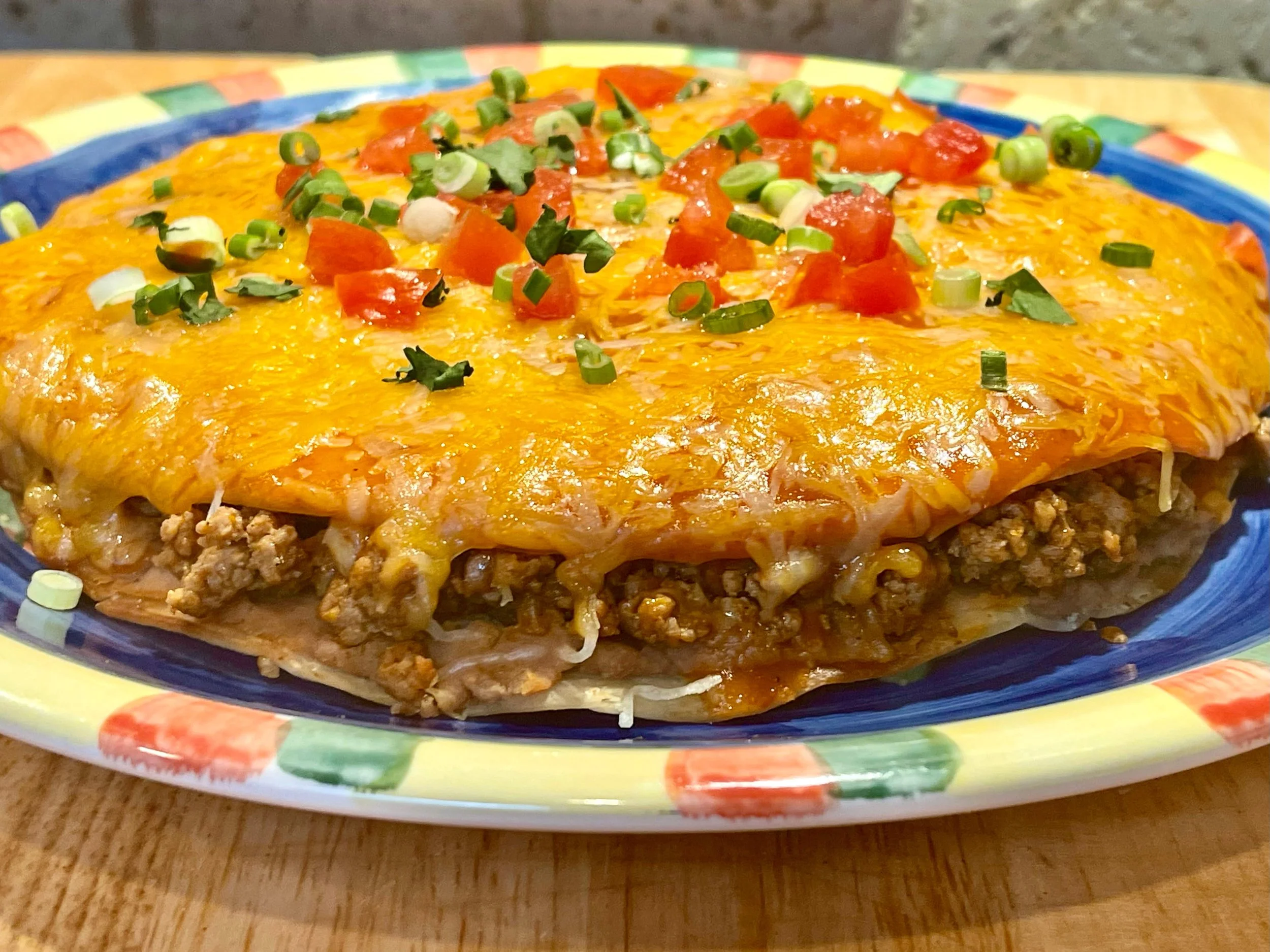 Mexican Pizza recipe complete and garnished