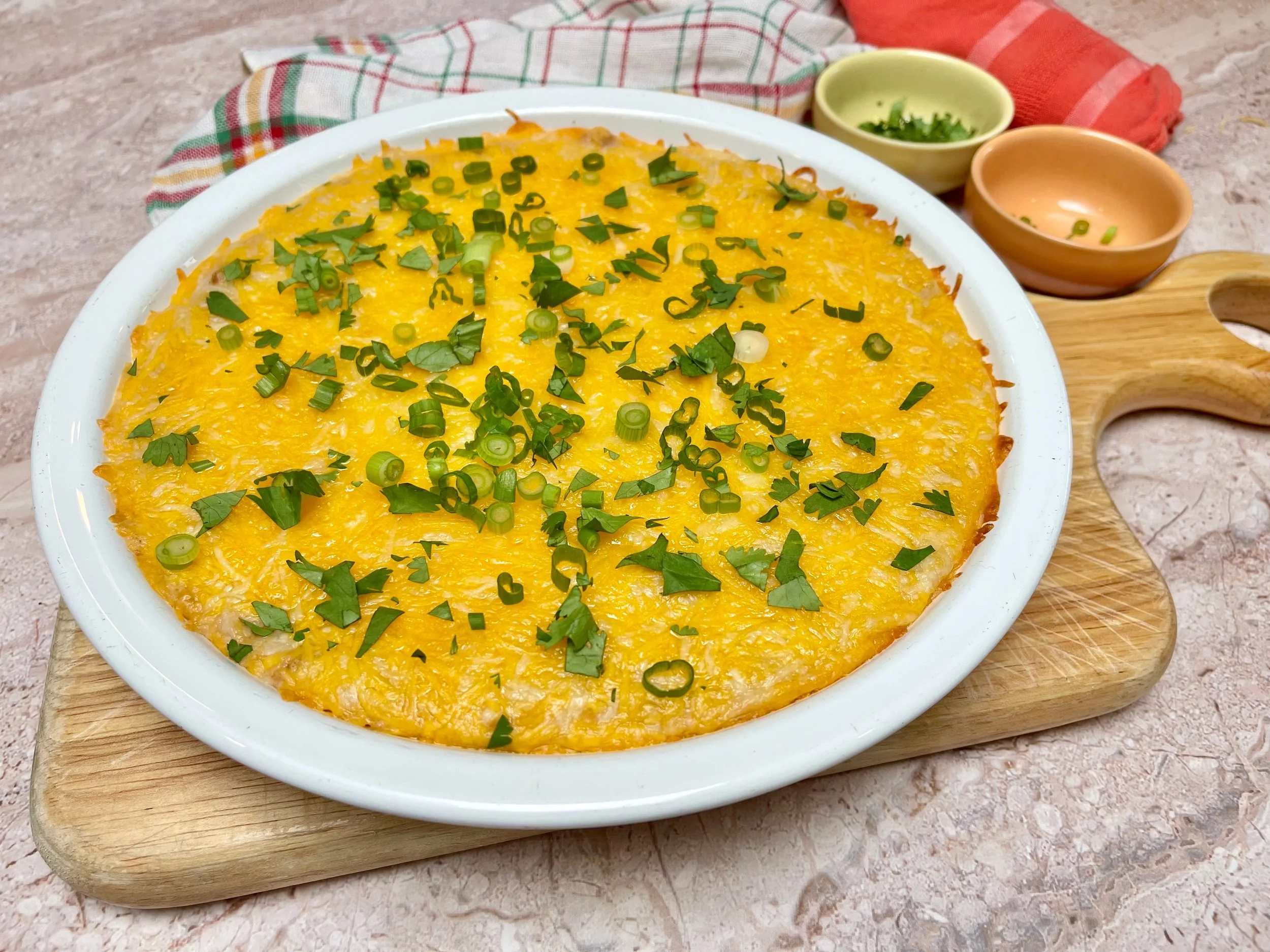 Garnished refried bean dip with cilantro and green onions