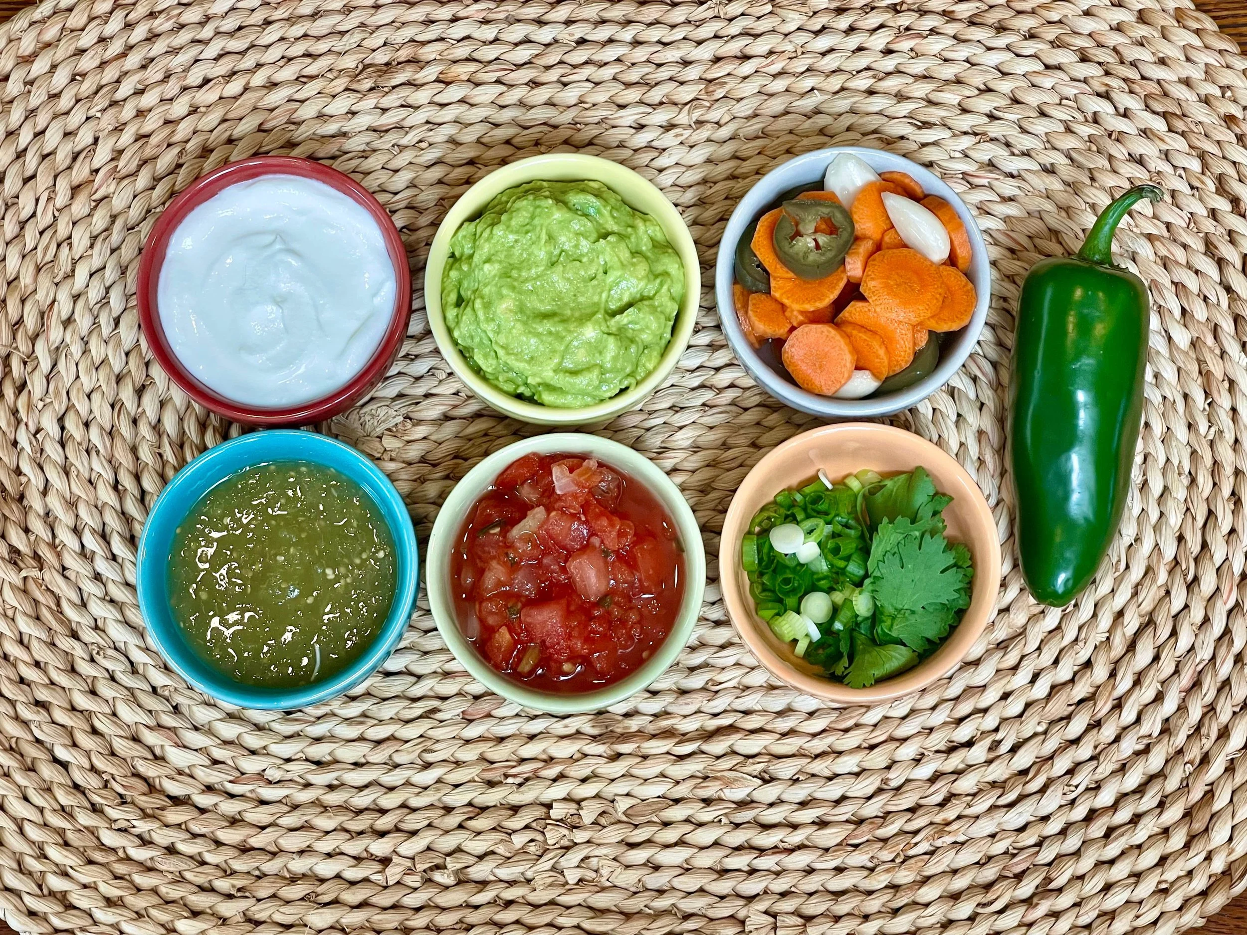 Salsas, sour cream, herbs, and guacamole