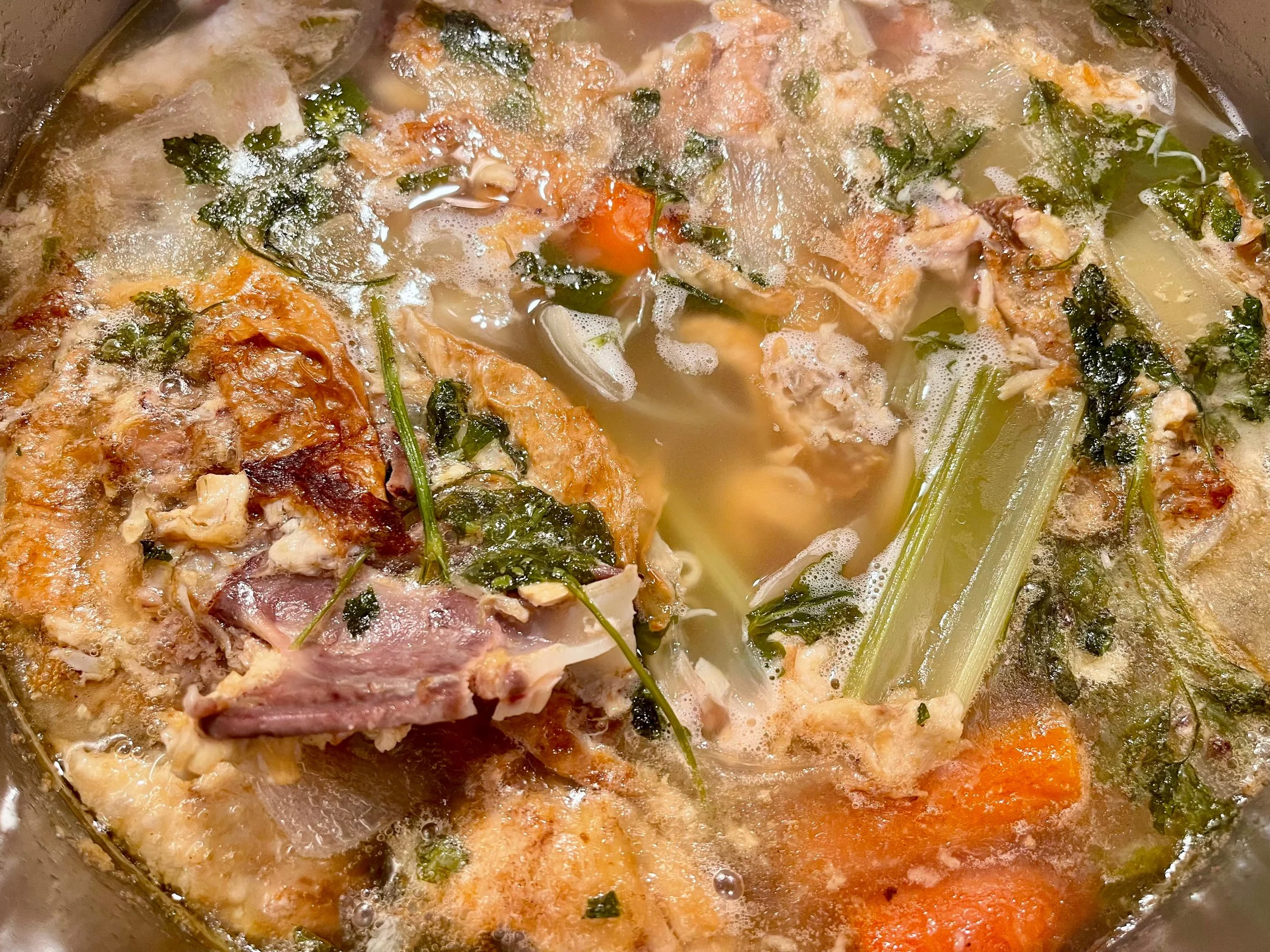 simmering the chicken stock