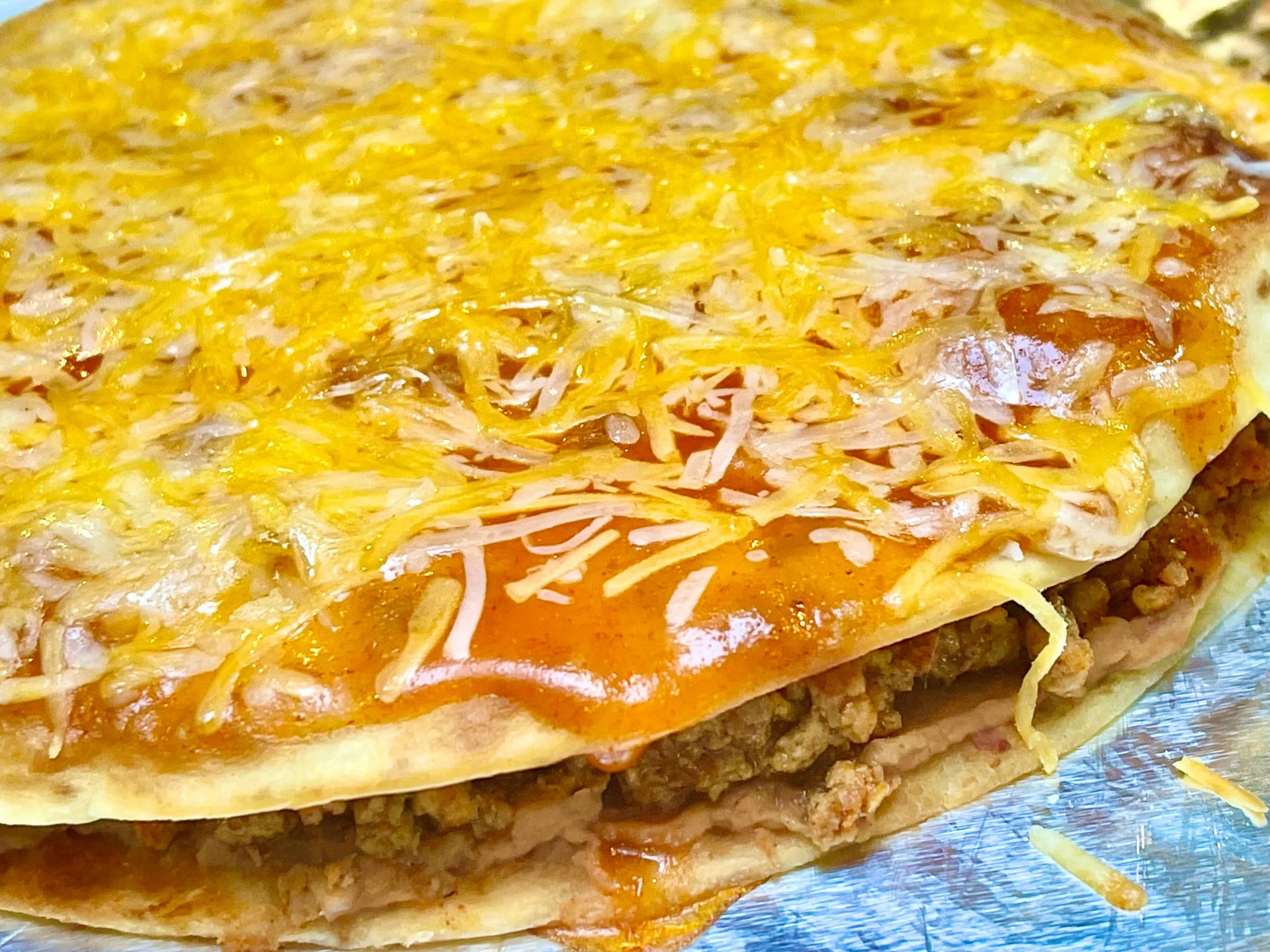 Cooke Mexican Pizza with melty cheese