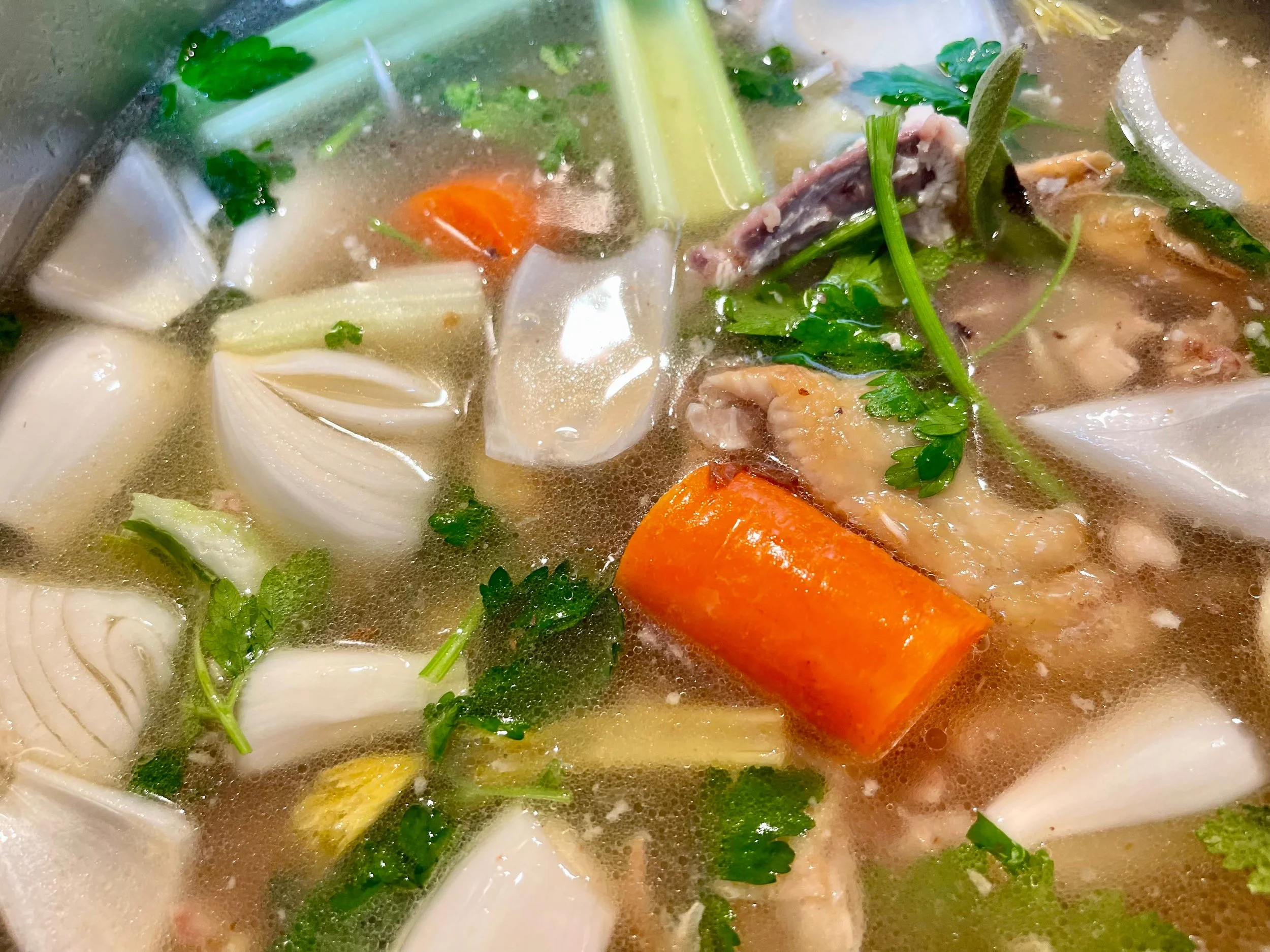 simmering the chicken stock