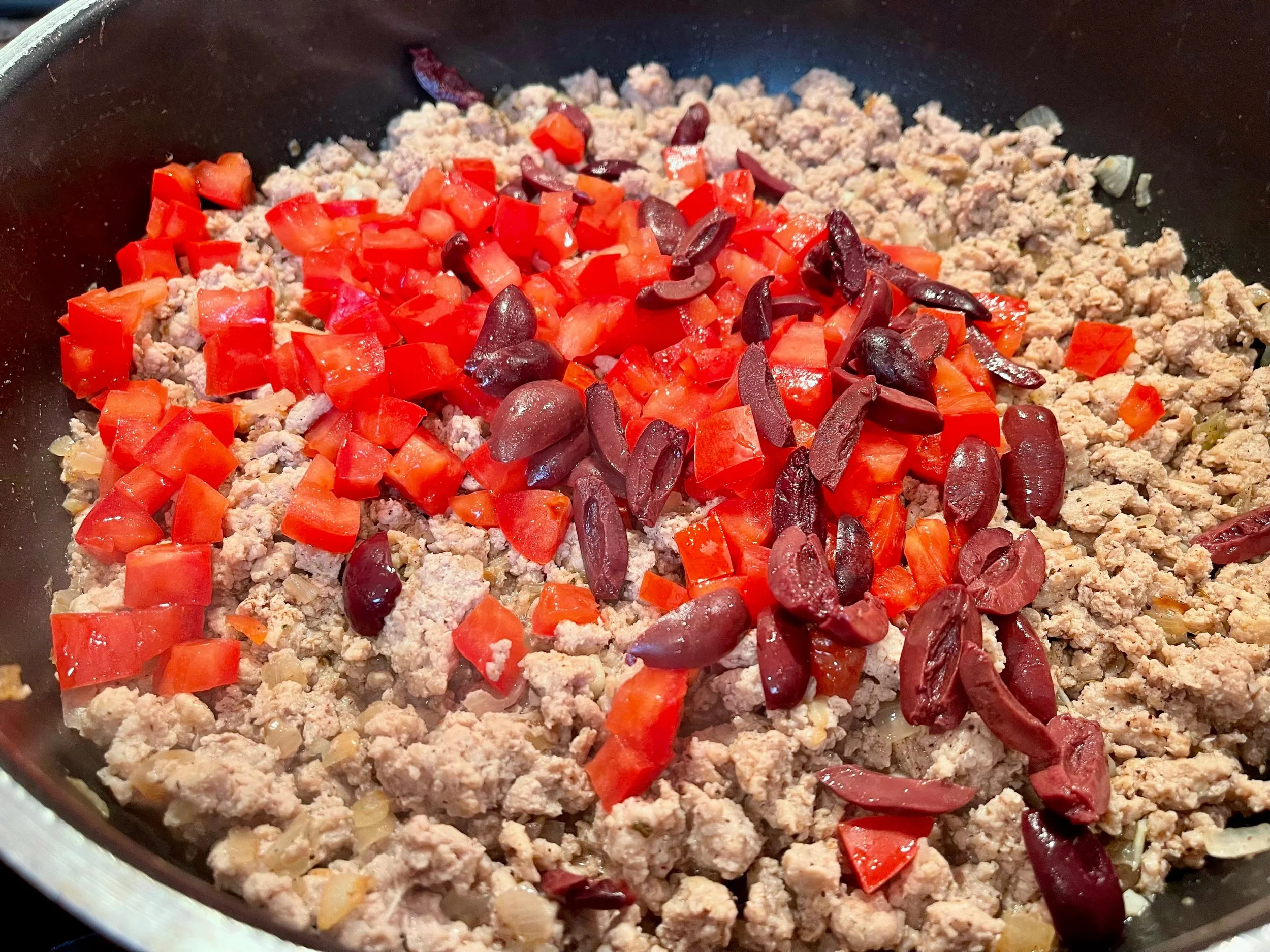 Tomatoes added to the meat