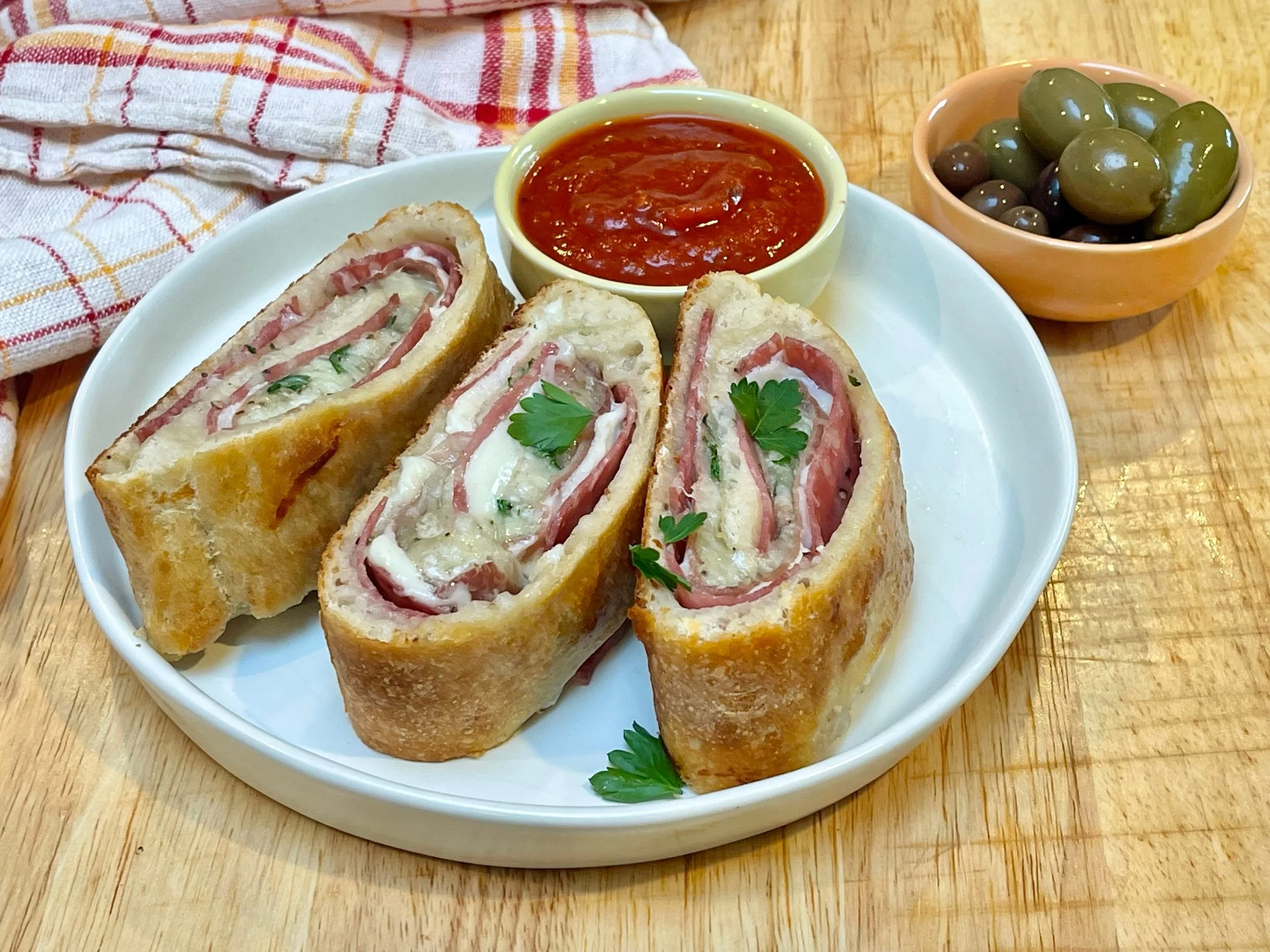 Serving pizza stromboli