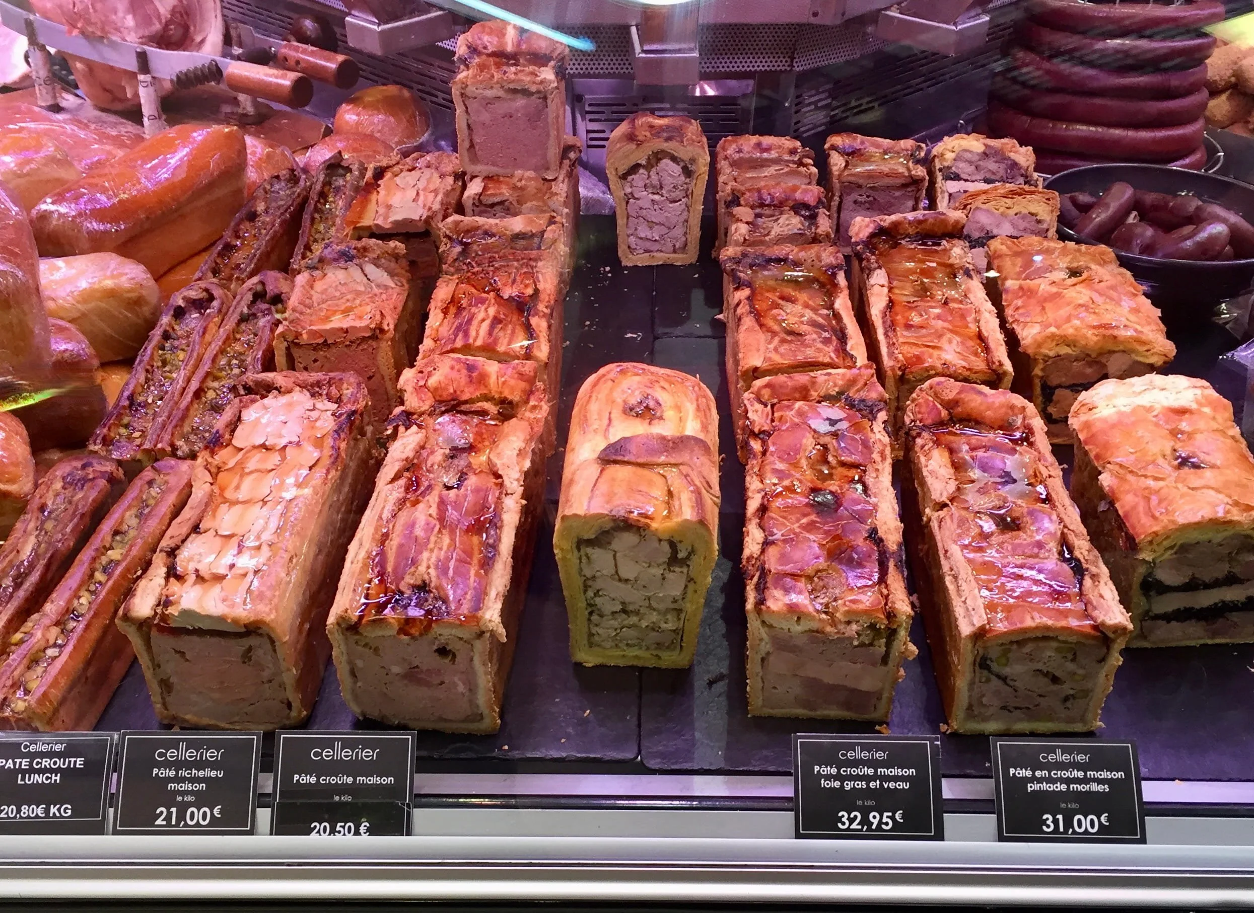 A display of pâté-en-croûte at Les Halles de Lyon Paul Bocuse