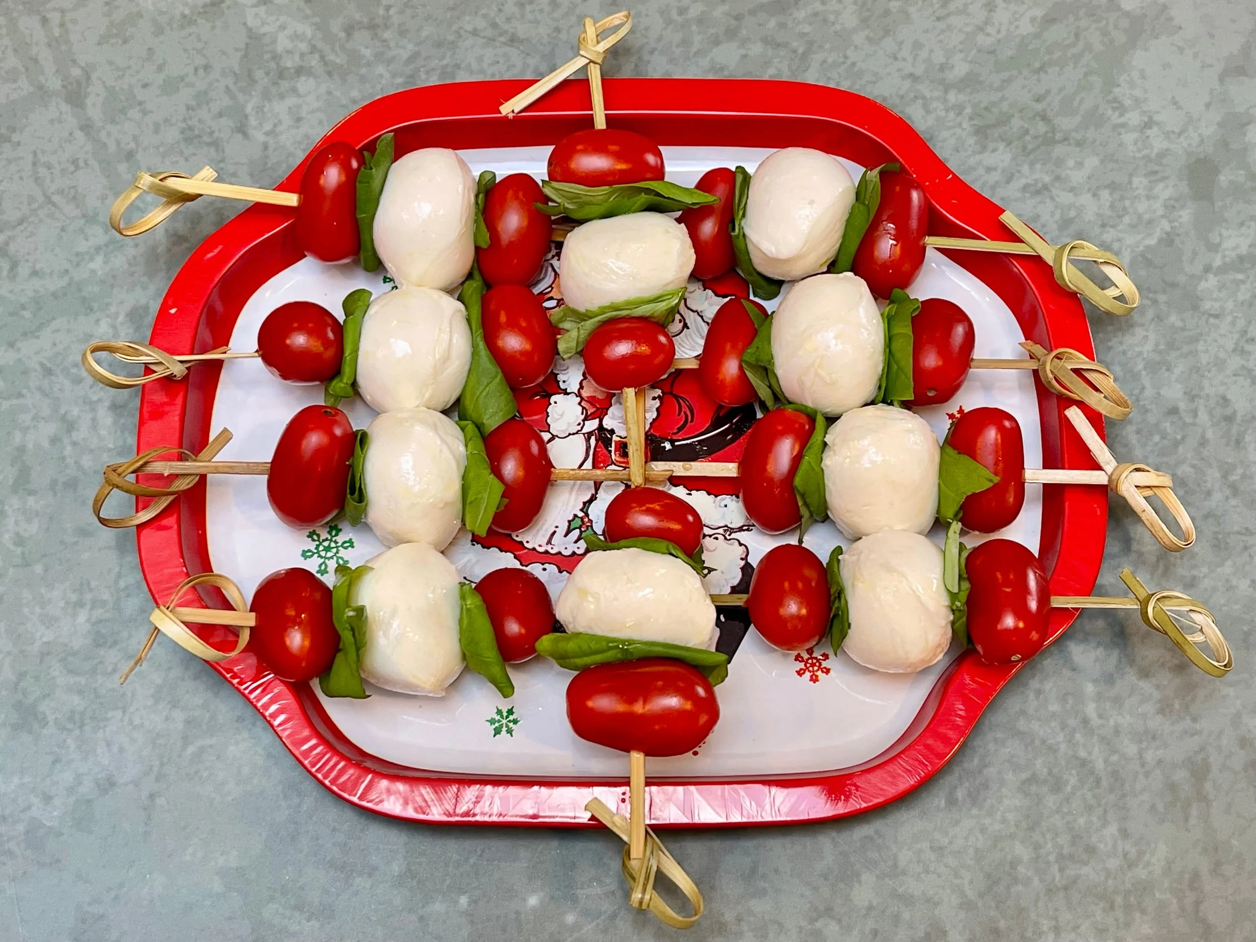Caprese sticks ready for balsamic glaze