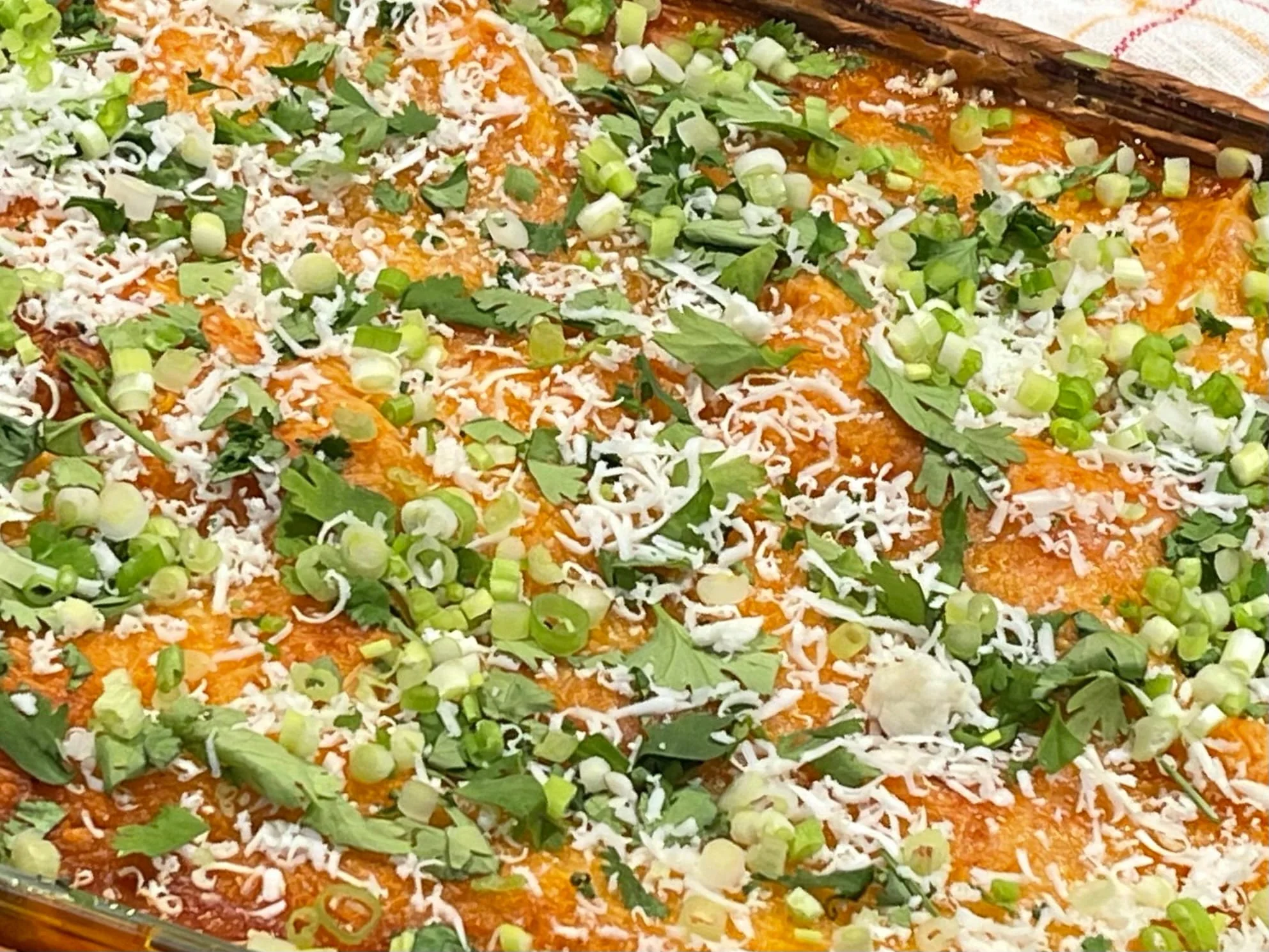 Chicken Enchilada Casserole with garnishes