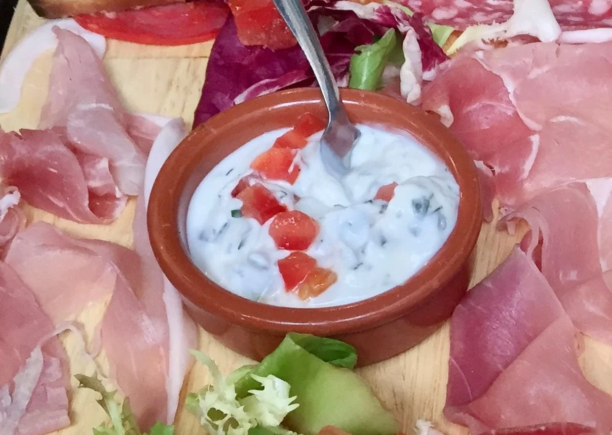 Cervelle de Canut on a charcuterie board in Lyon