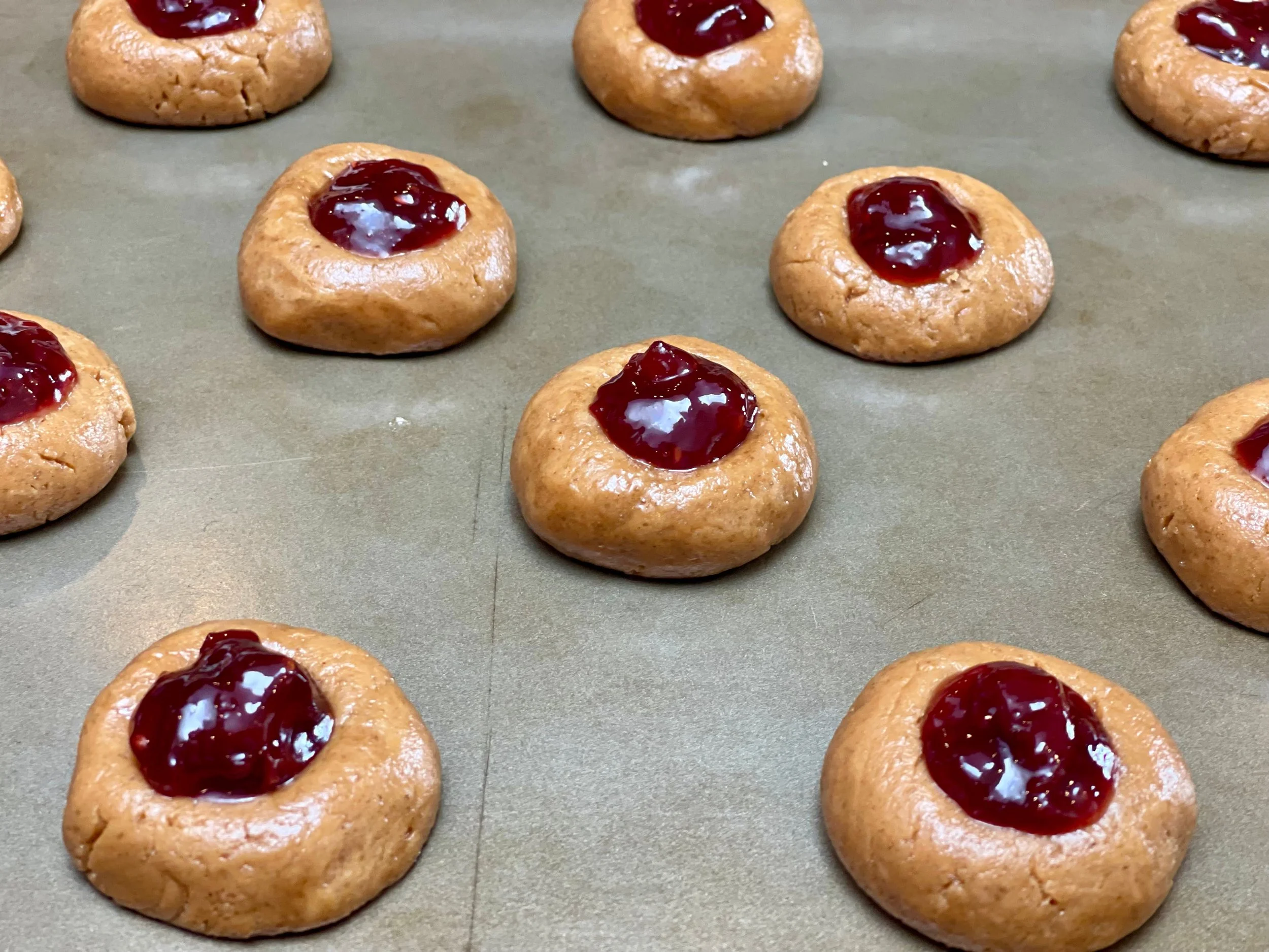 Thumbprint Peanut Butter and Jelly Cookies ready for the oven