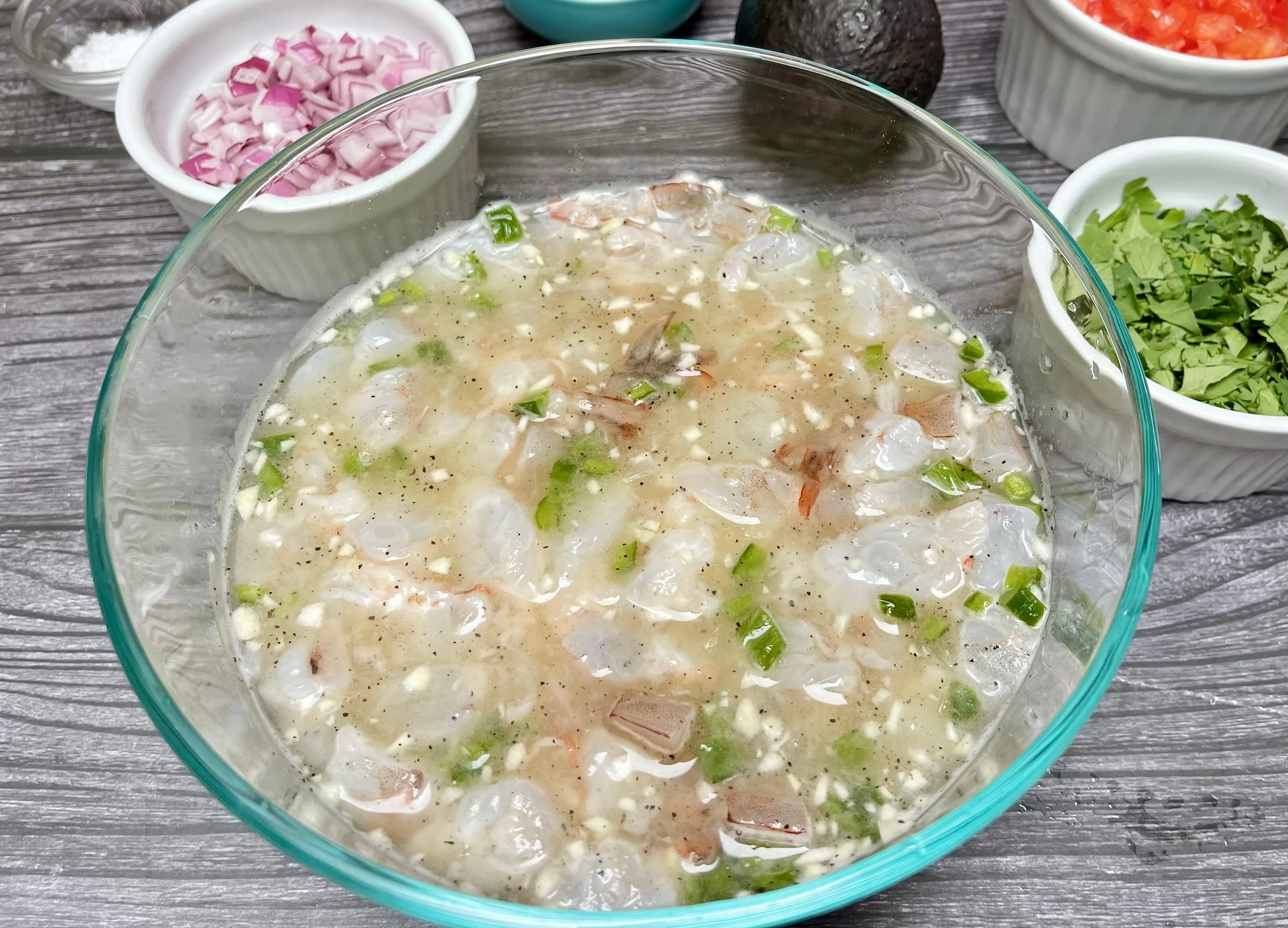 marinating the shrimp in citrus marinade