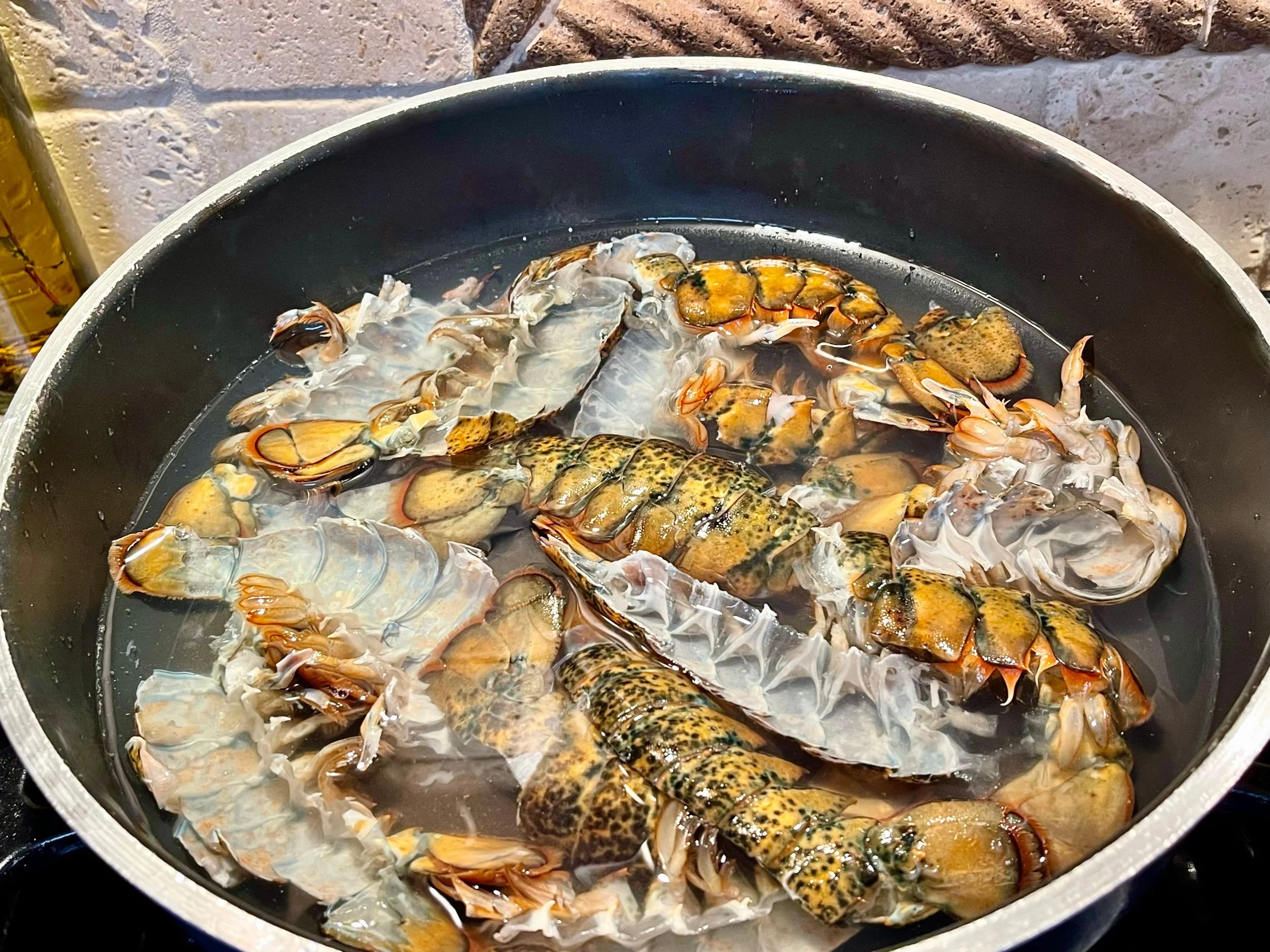 Lobster shells simmering in water