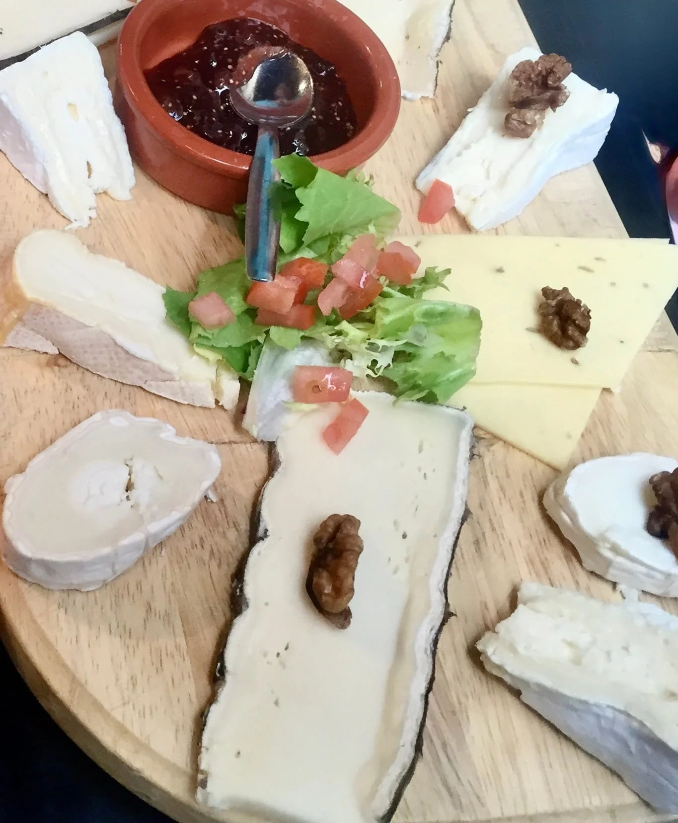 Saint-Marcellin and local cheeses served at the end of a meal