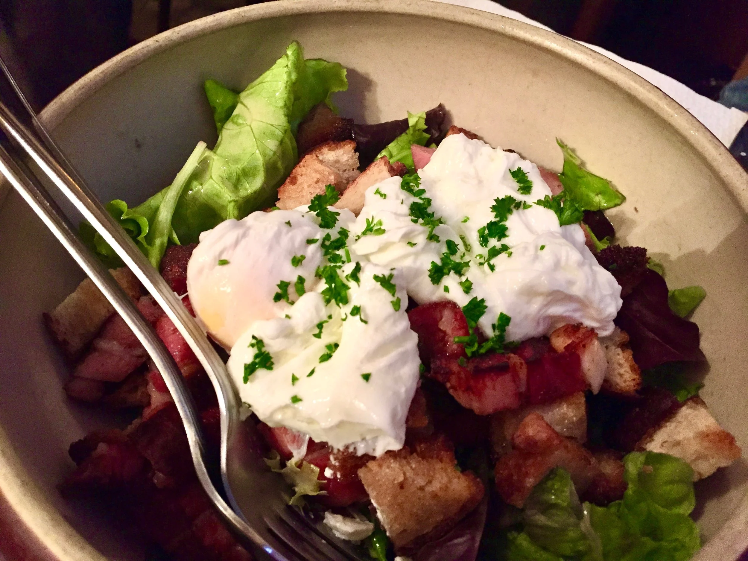 Salade Lyonnaise with poached eggs and lardons