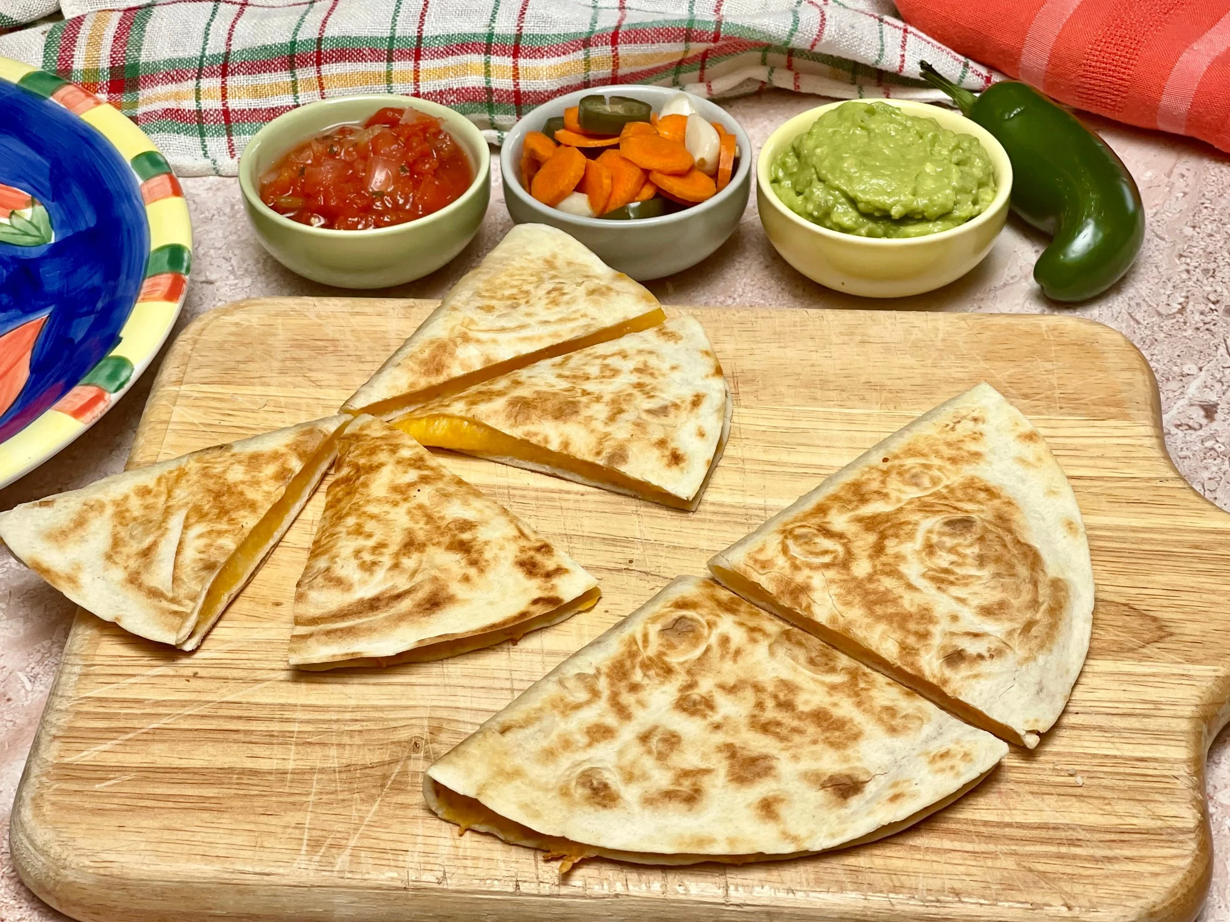 Cutting cheese quesadillas