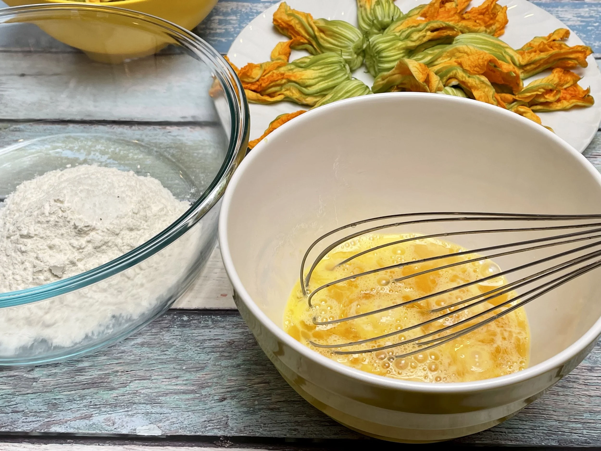 eggs and flour in separate bowls