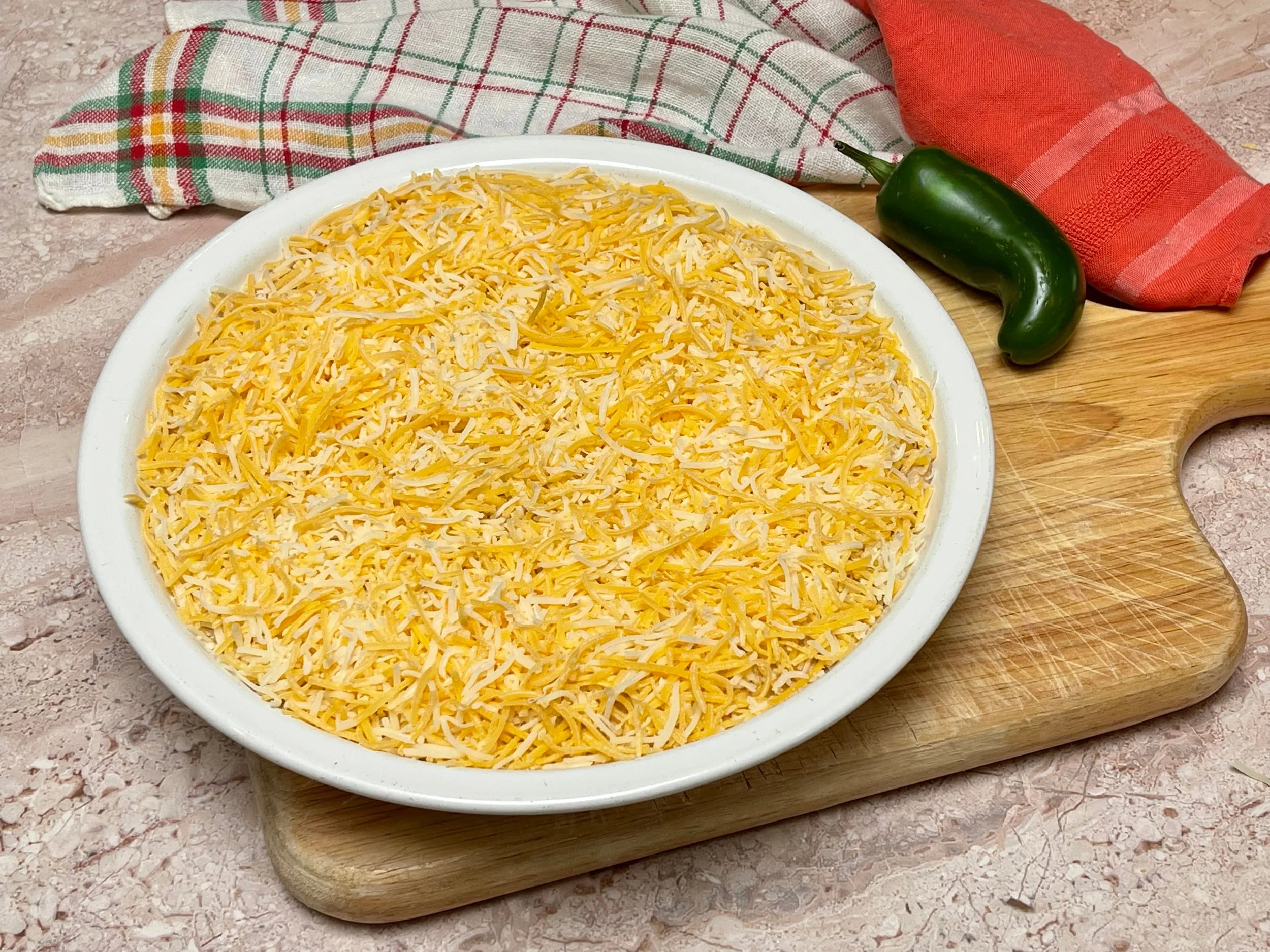 Bean dip topped with cheese