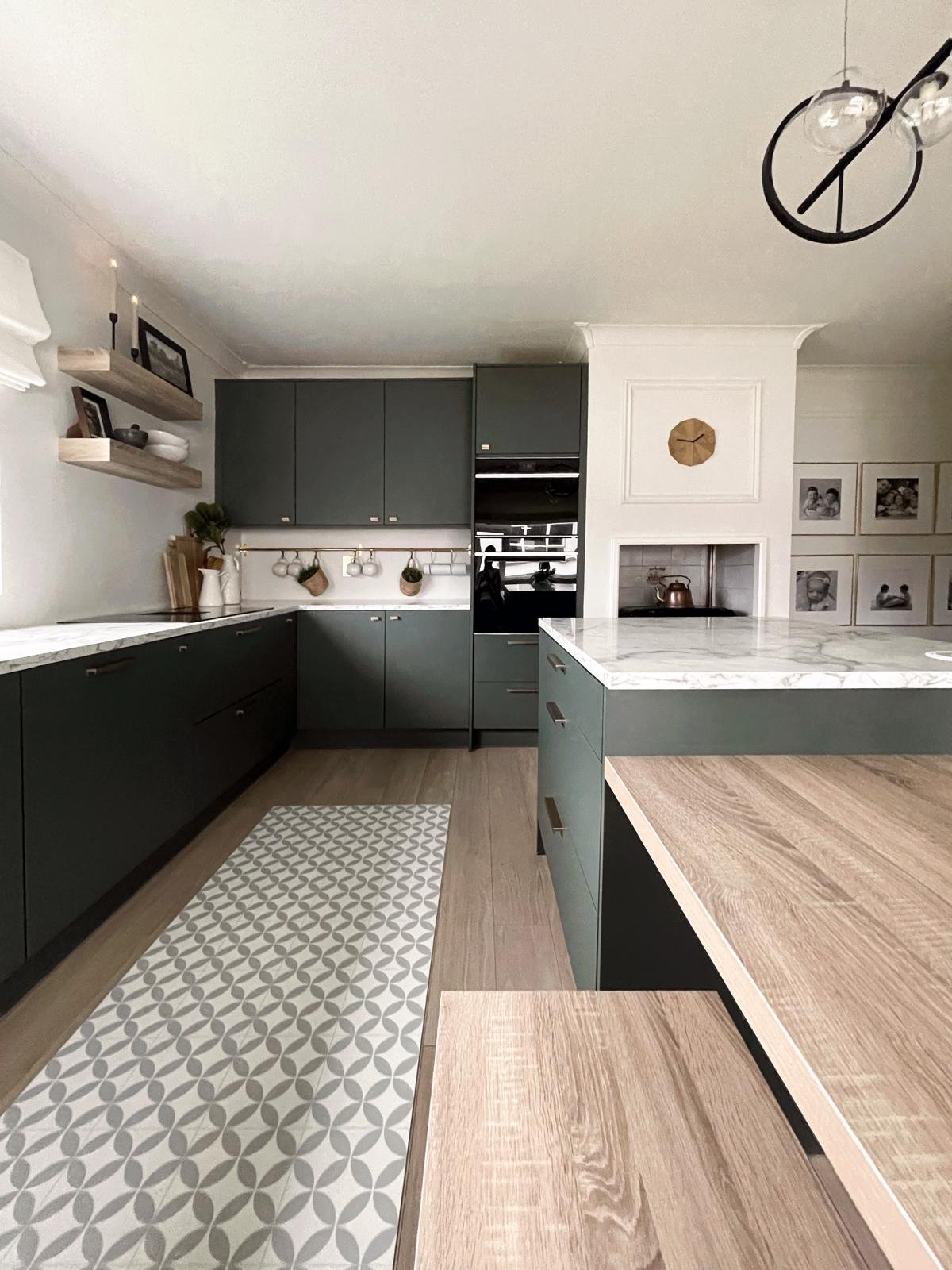 Galley-style kitchen with patterned flooring, streamlined cabinetry, and a layout designed for easy everyday flow.