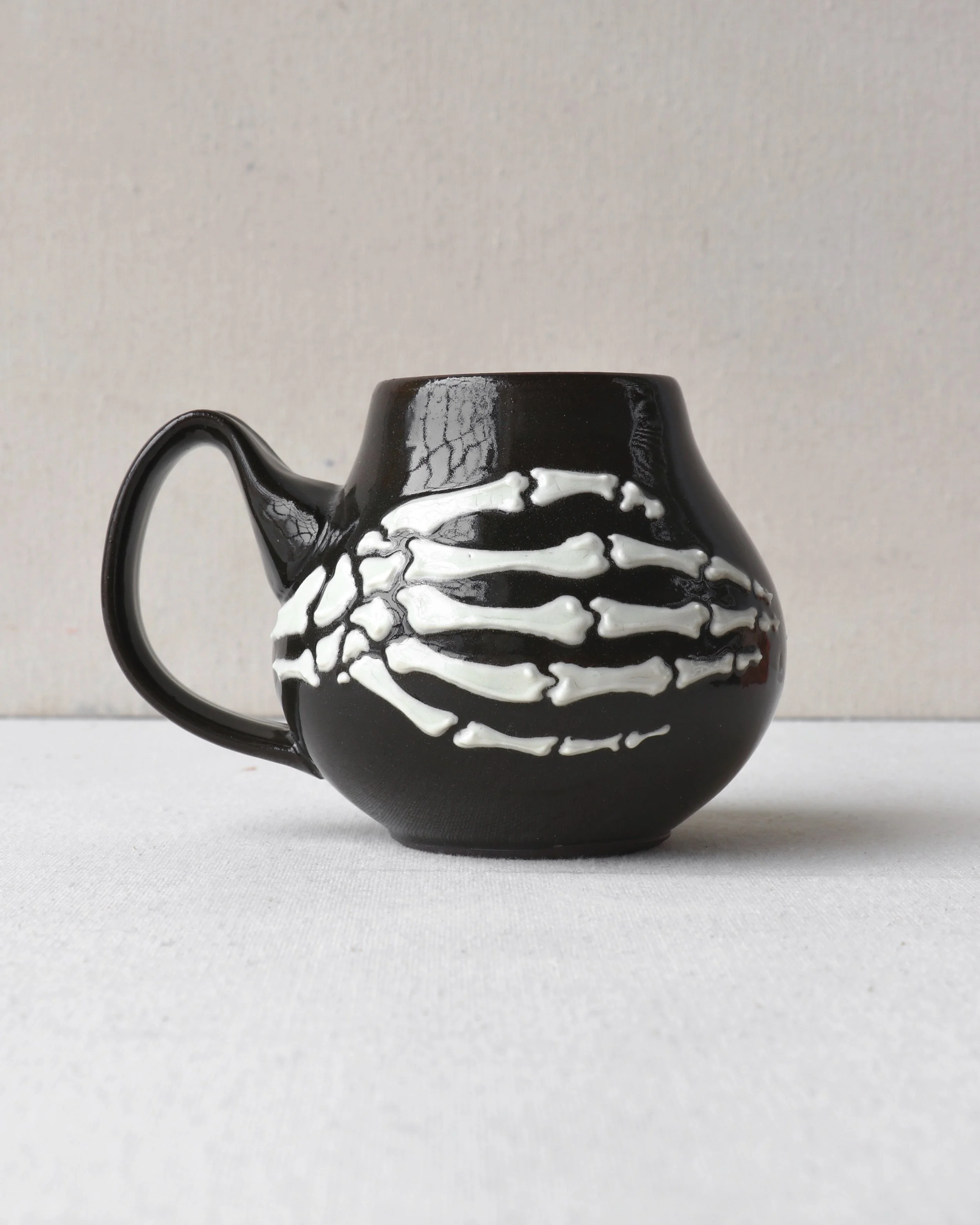 Skeleton Hand Belly Mug 2
