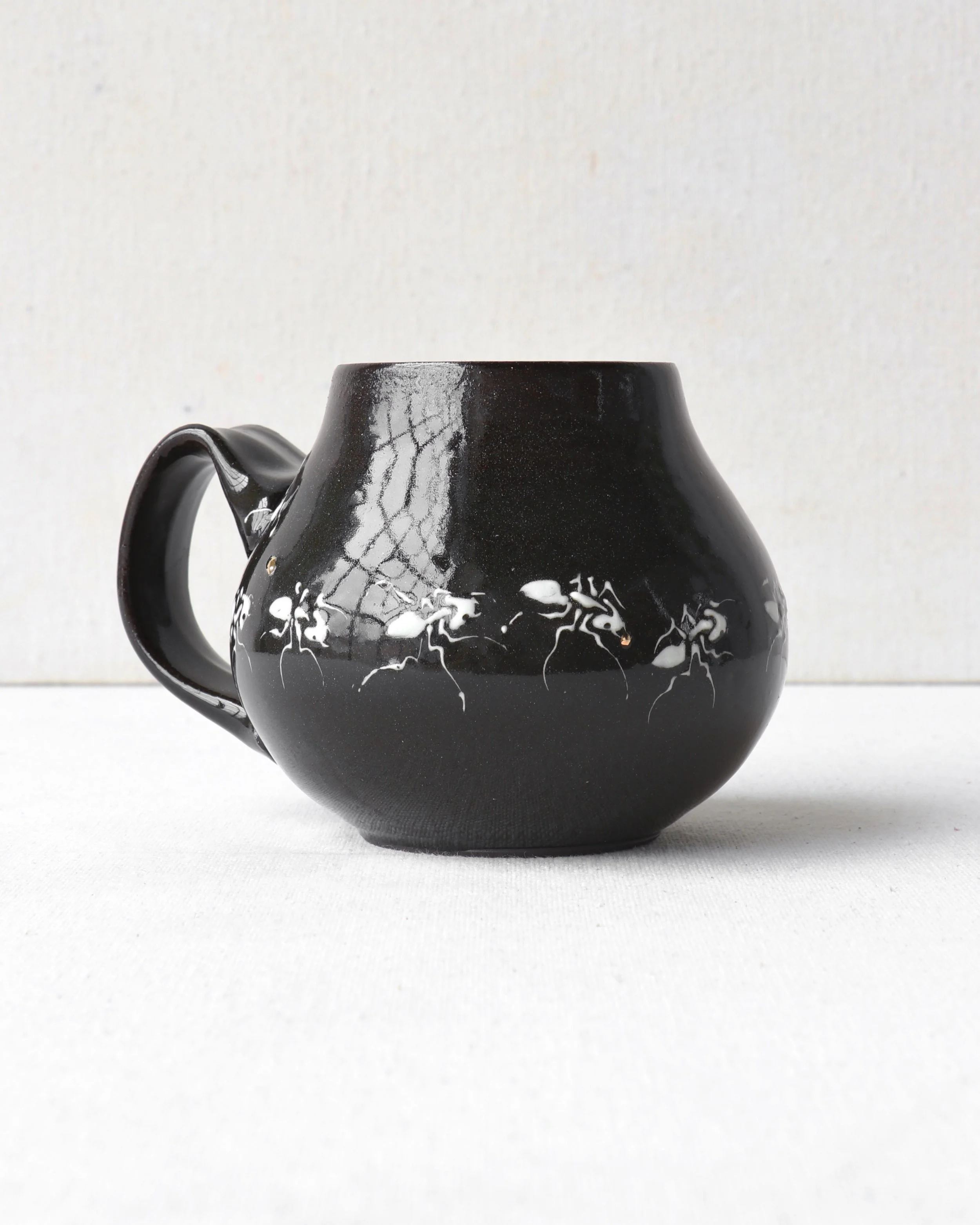 Ant Parade Belly Mug with Gold Accents
