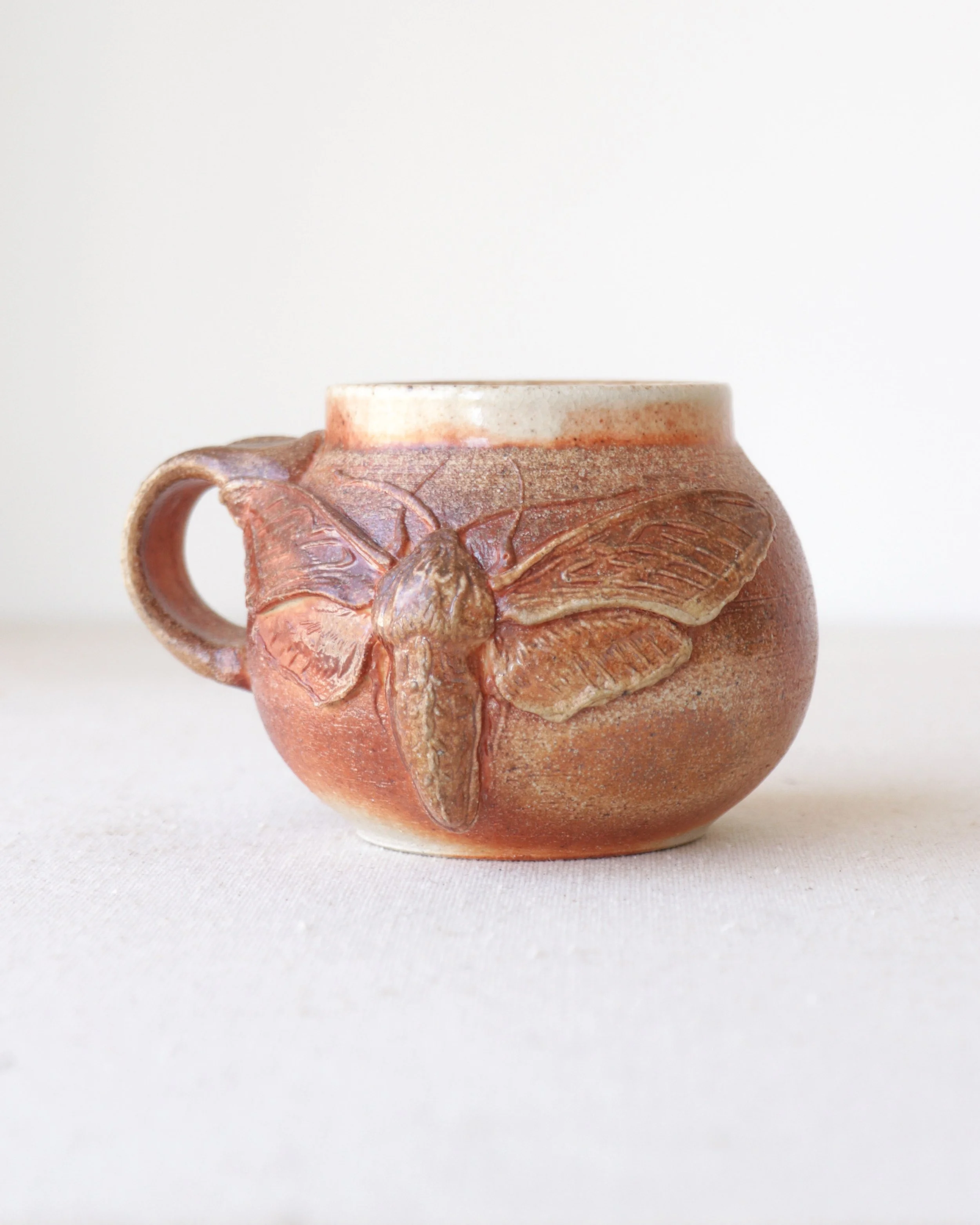 Round Wood Fire Sphinx Moth Mug