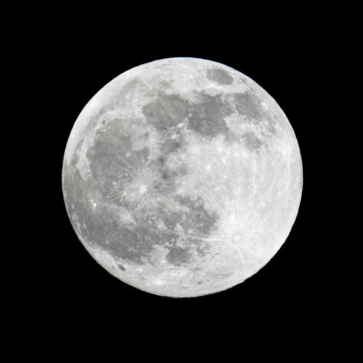A full moon against a black night sky.