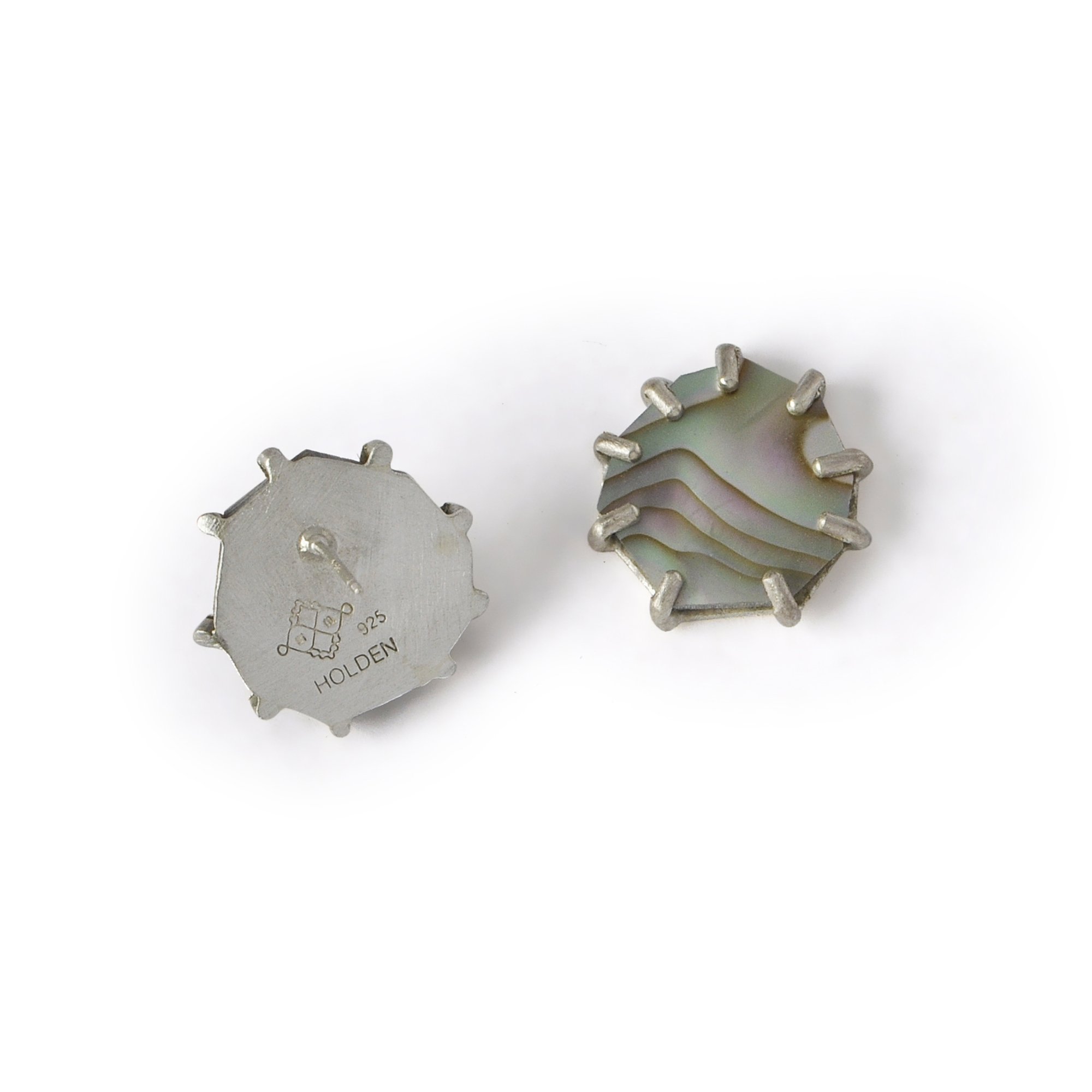 pink purple and green abalone shell earrings with one back showing artist's logo and hallmark reading HOLDEN stamped in silver backing