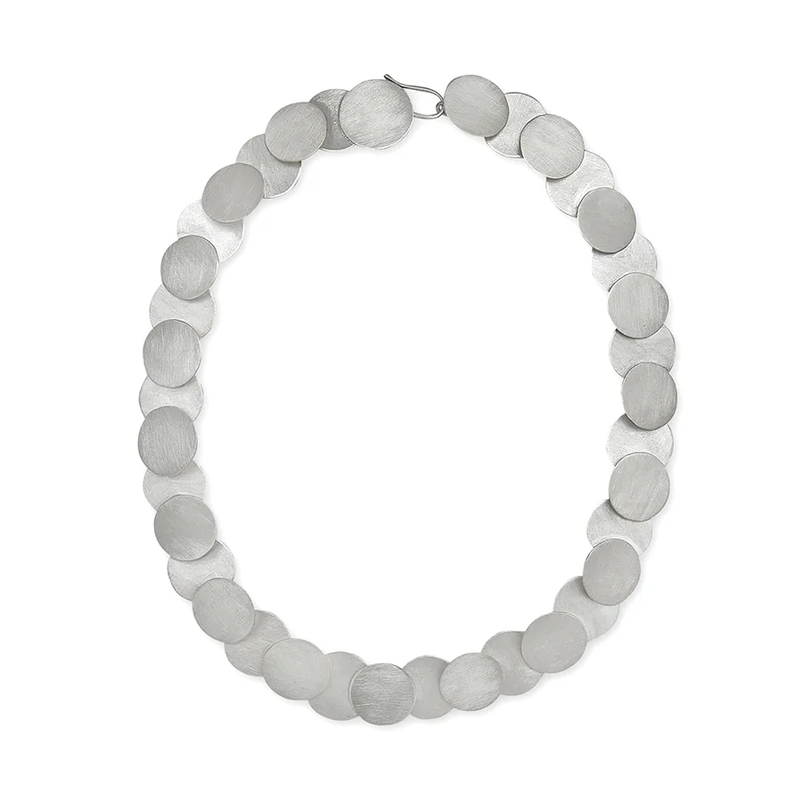 sterling silver necklace with links that are small and round and looks like a pearl necklace