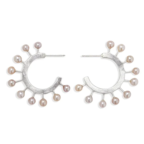 sterling silver hoop earrings with light pin freshwater pearls around the hoop