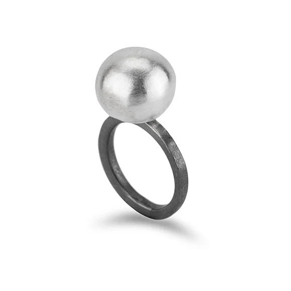 single ring with black sterling silver band and a polished round ball on top of ring