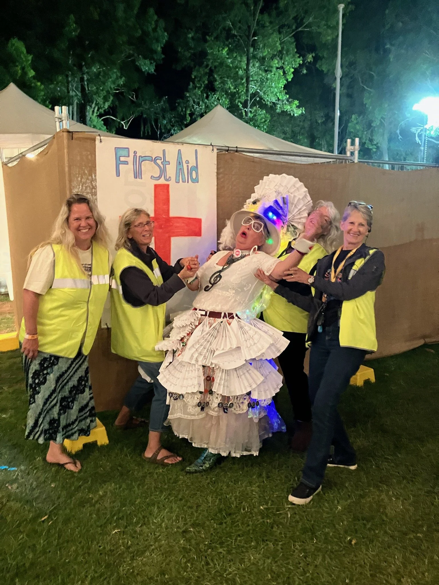 Ambulance and first aid officers helping a client!