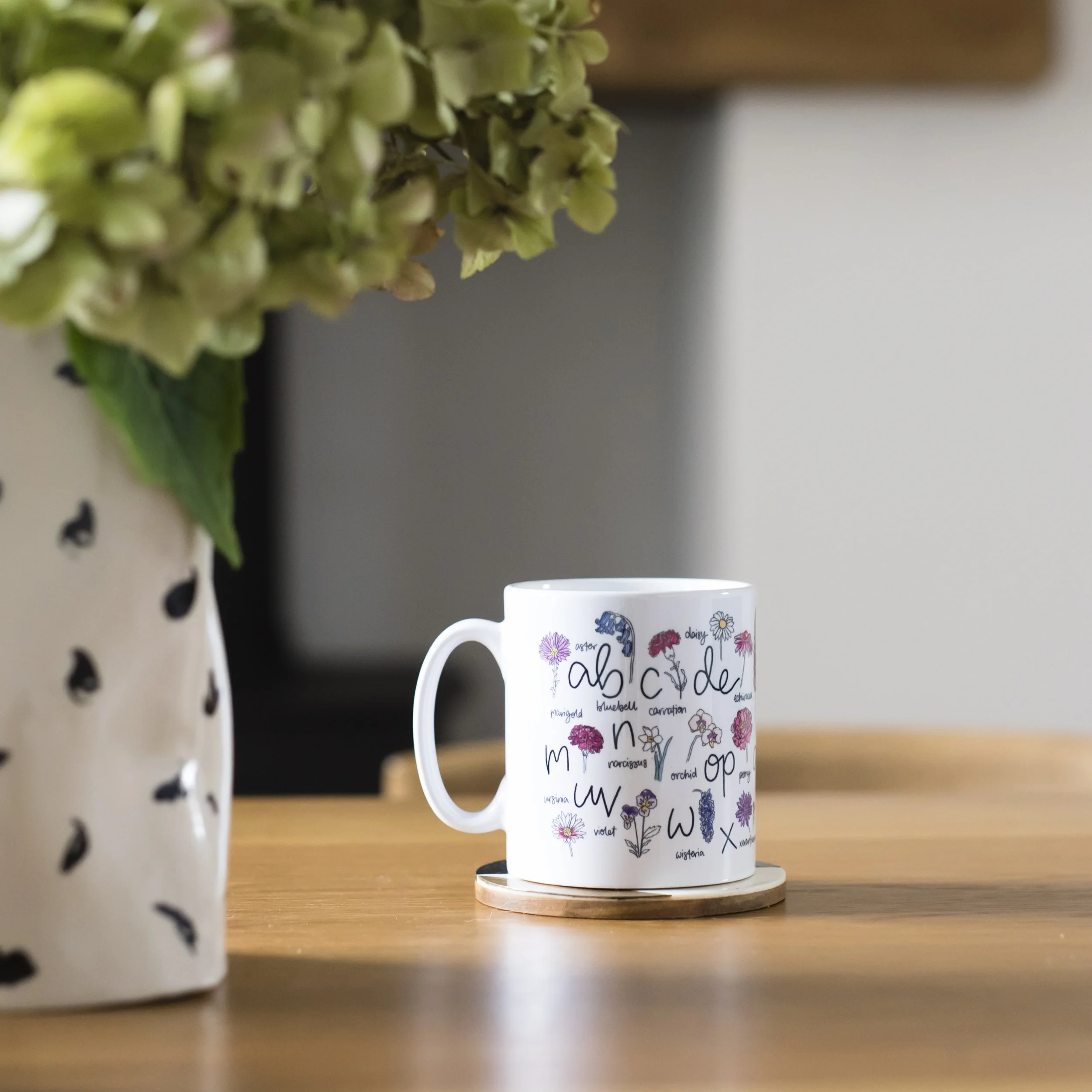 Floral mug on table 2 - DaphneRosa.jpg
