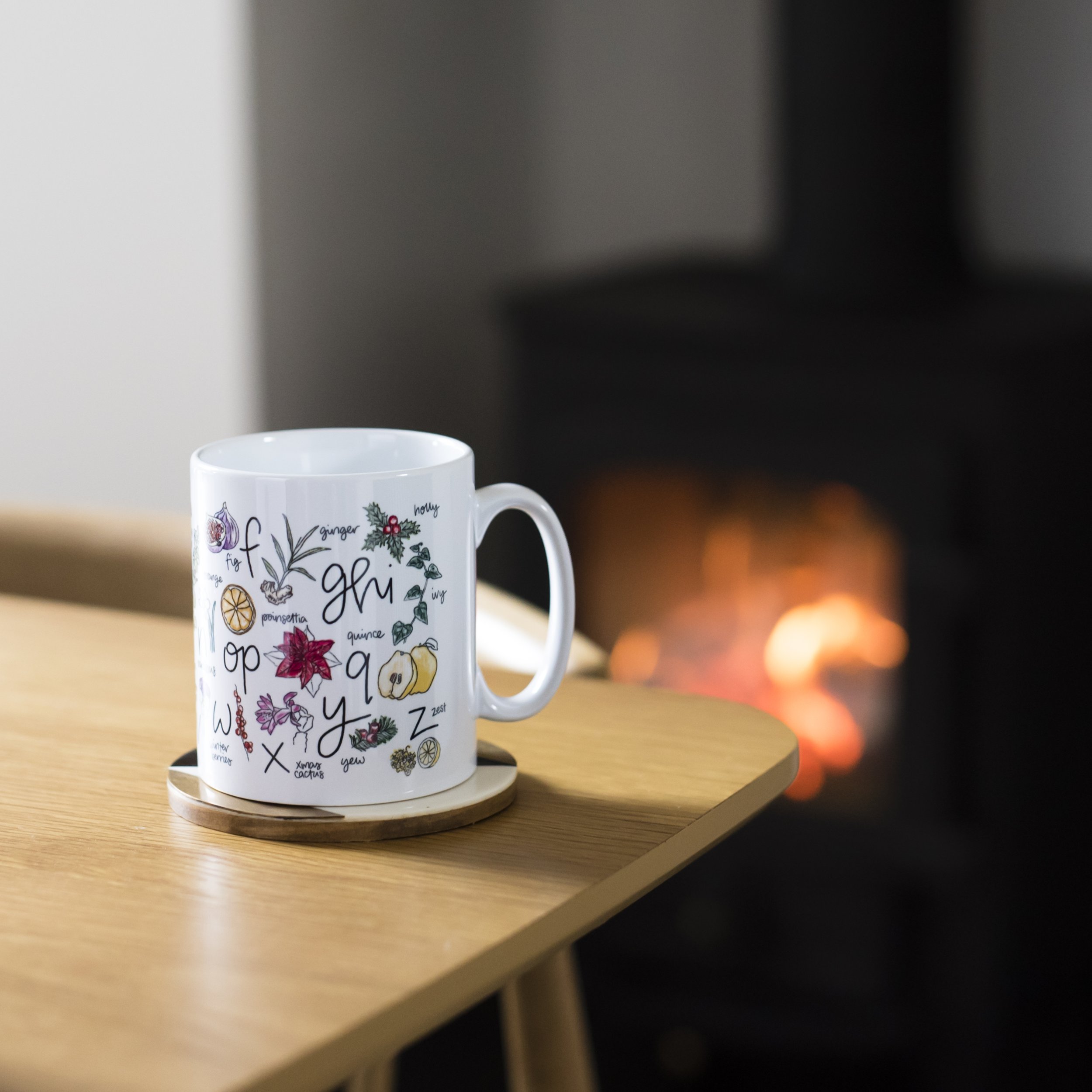 Christmas mug in front of fire 2 - DaphneRosa.jpg