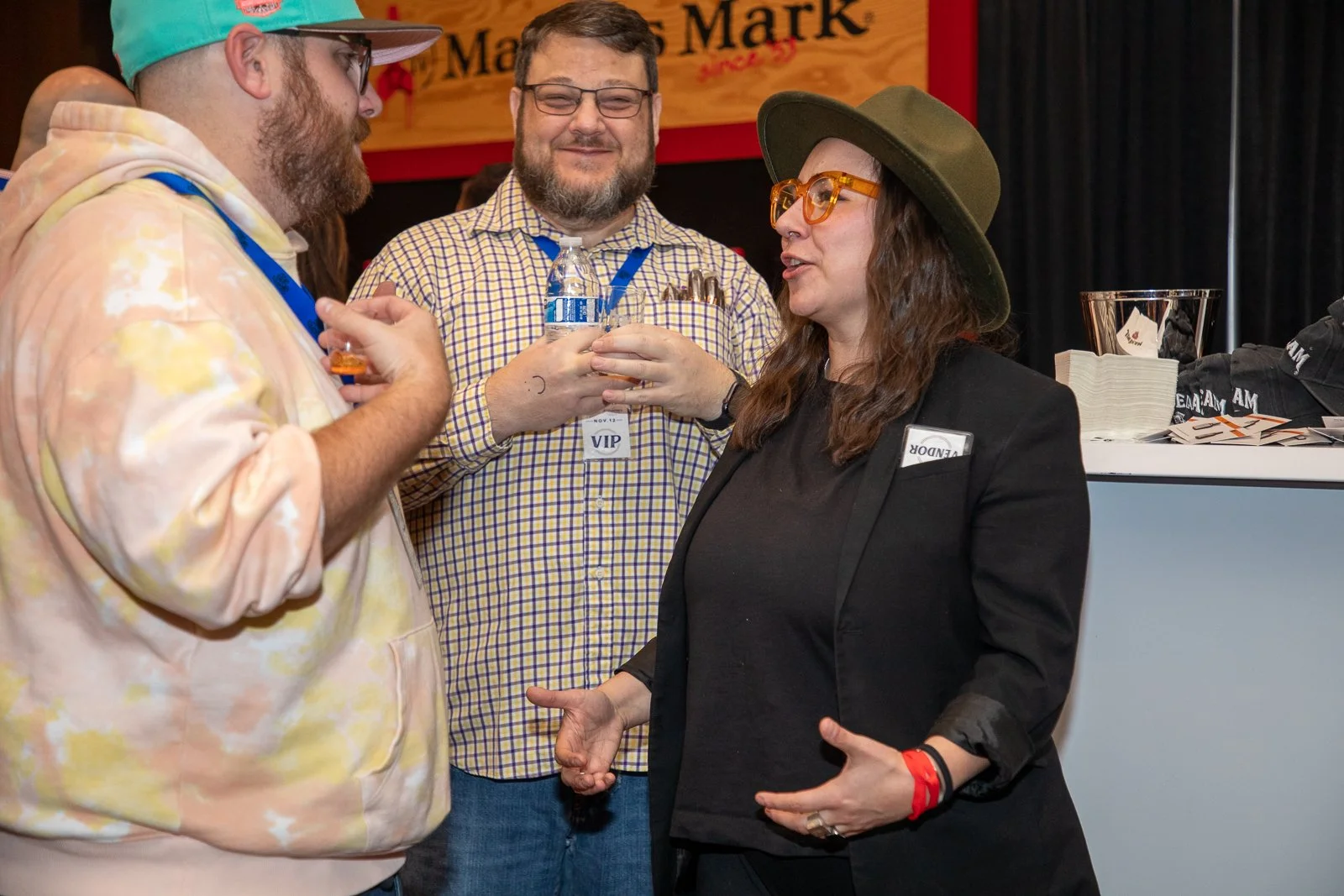Guests talking at a past Louisiana Bourbon Festival