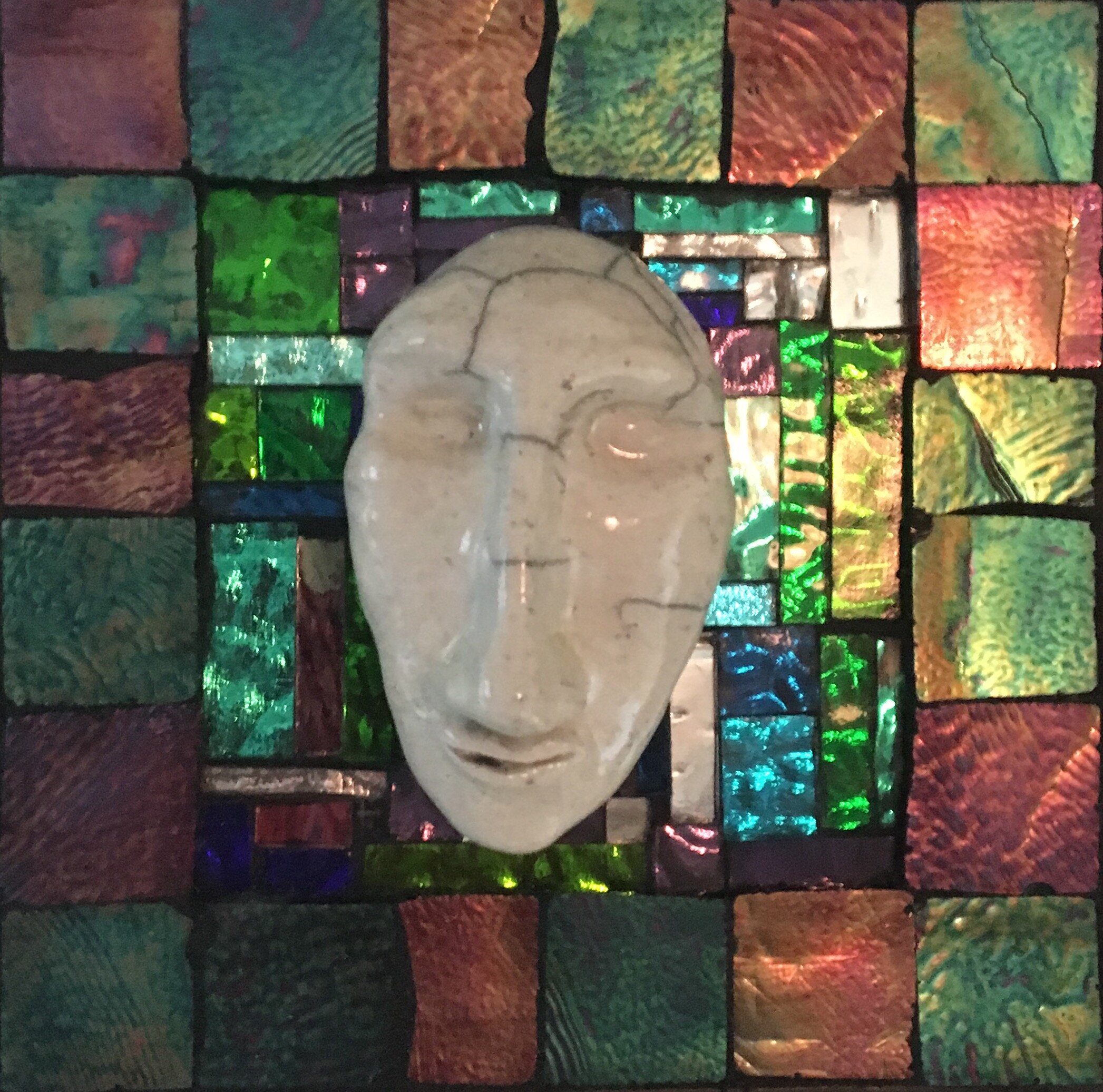 "Twilight" - raku fired ceramic head, glass tiles on board