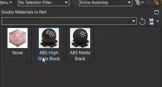 Selecting Ray Traced Studio materials in Siemens NX: Choosing between ABS High Gloss Black and ABS Matte Black for photorealistic plastic rendering.