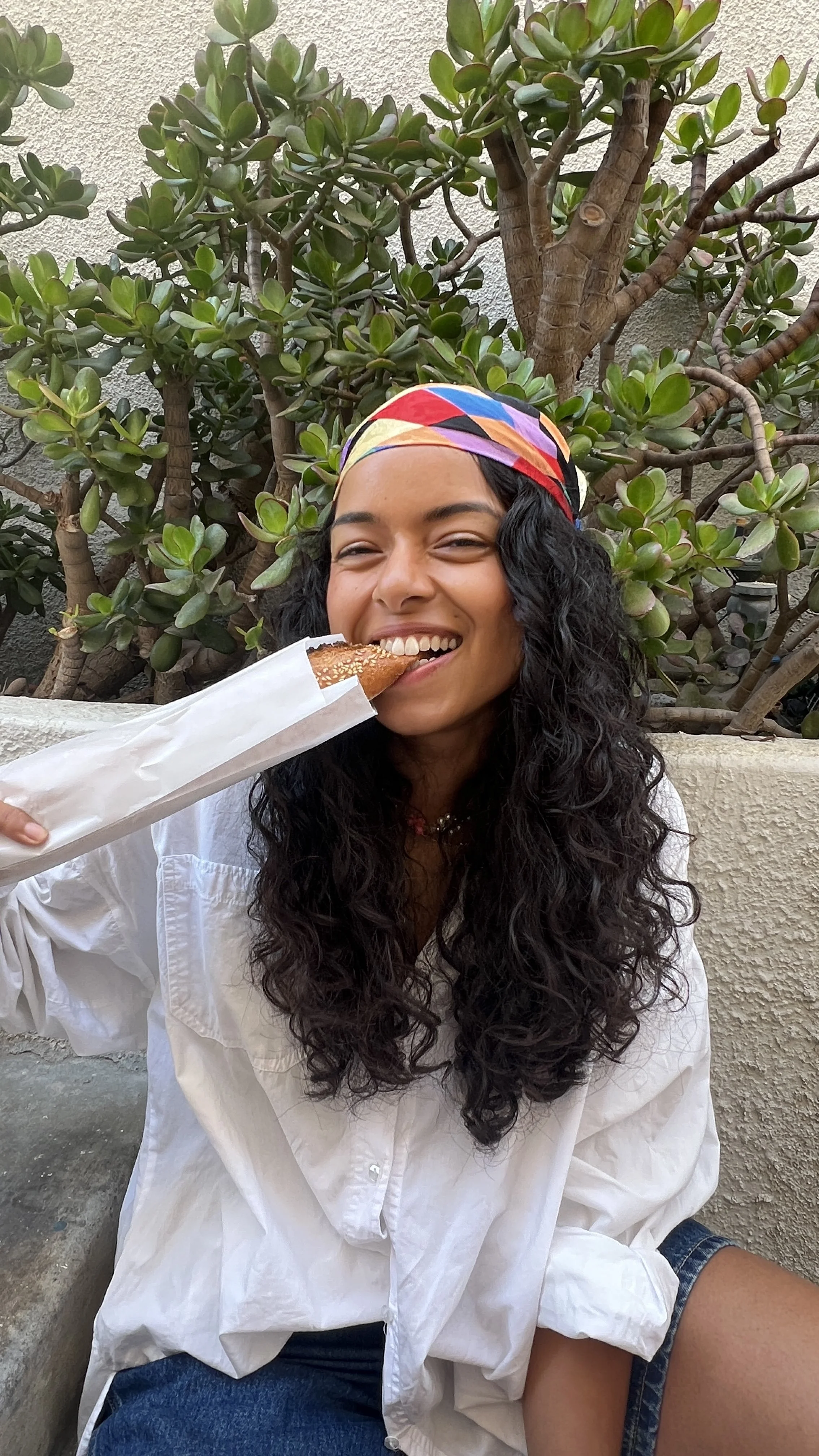 Chantelle biting into the baguette of life