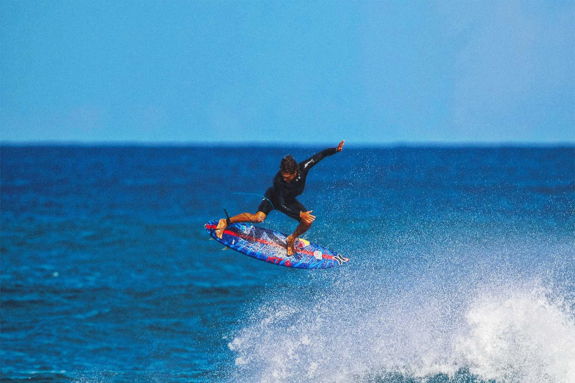 surfer doing an air