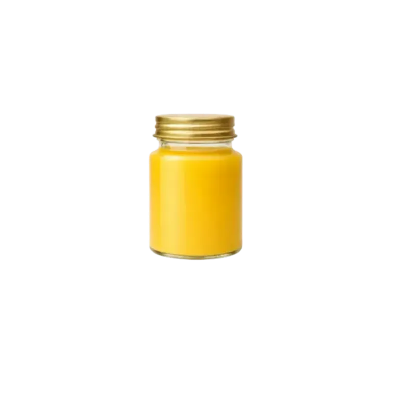 Golden ginger juice in glass jar.png