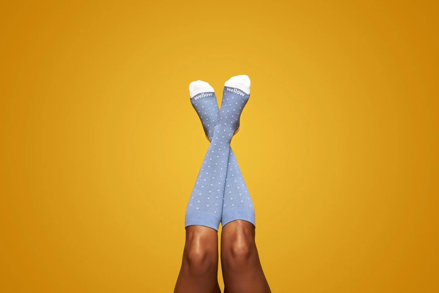 Professional product photography featuring Wellow socks.