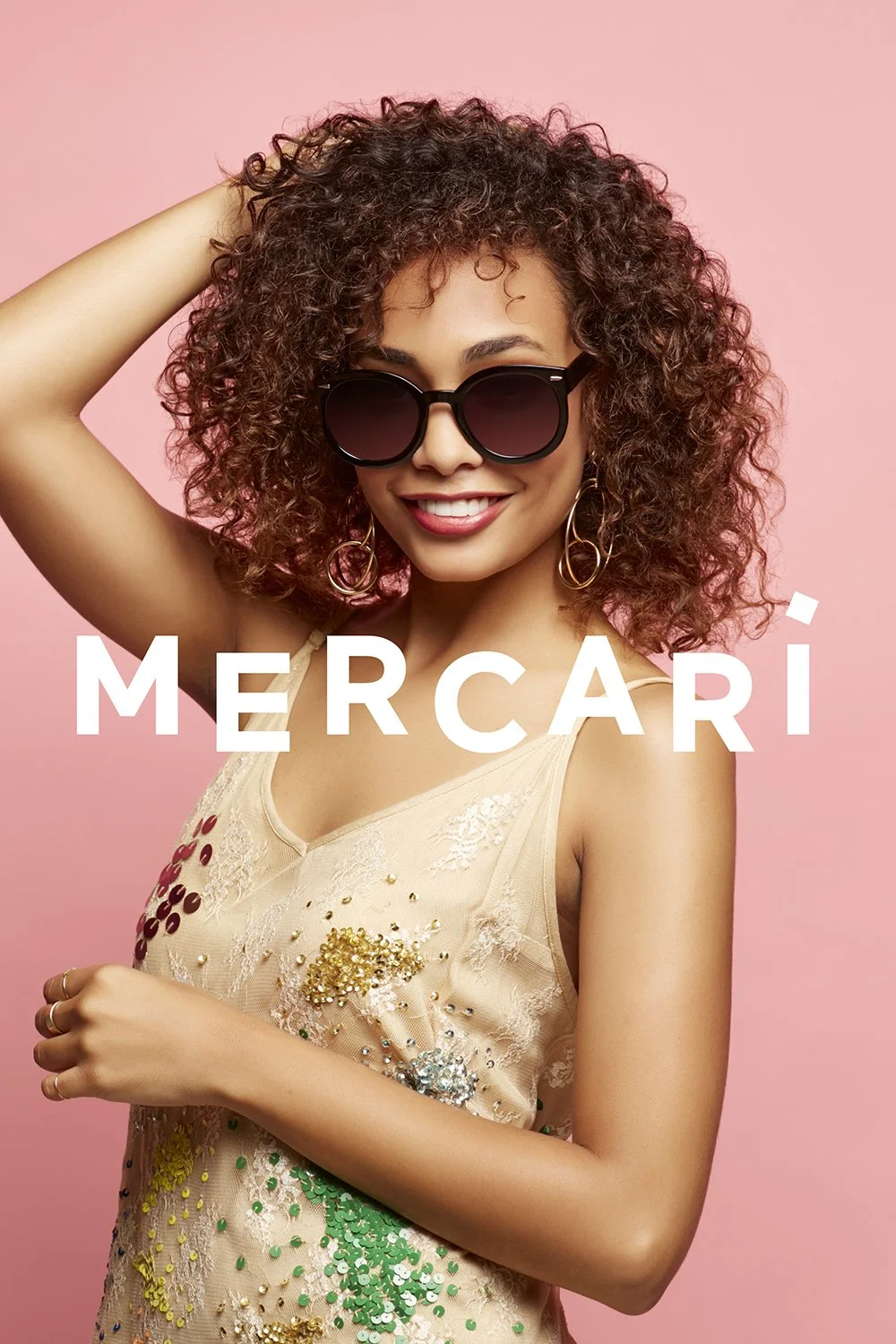 Professional product photography featuring the e-commerce app Mercari.