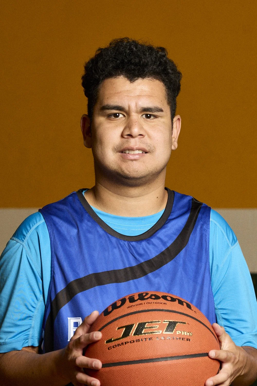 Professional portrait featuring a Special Olympics Basketball athlete.