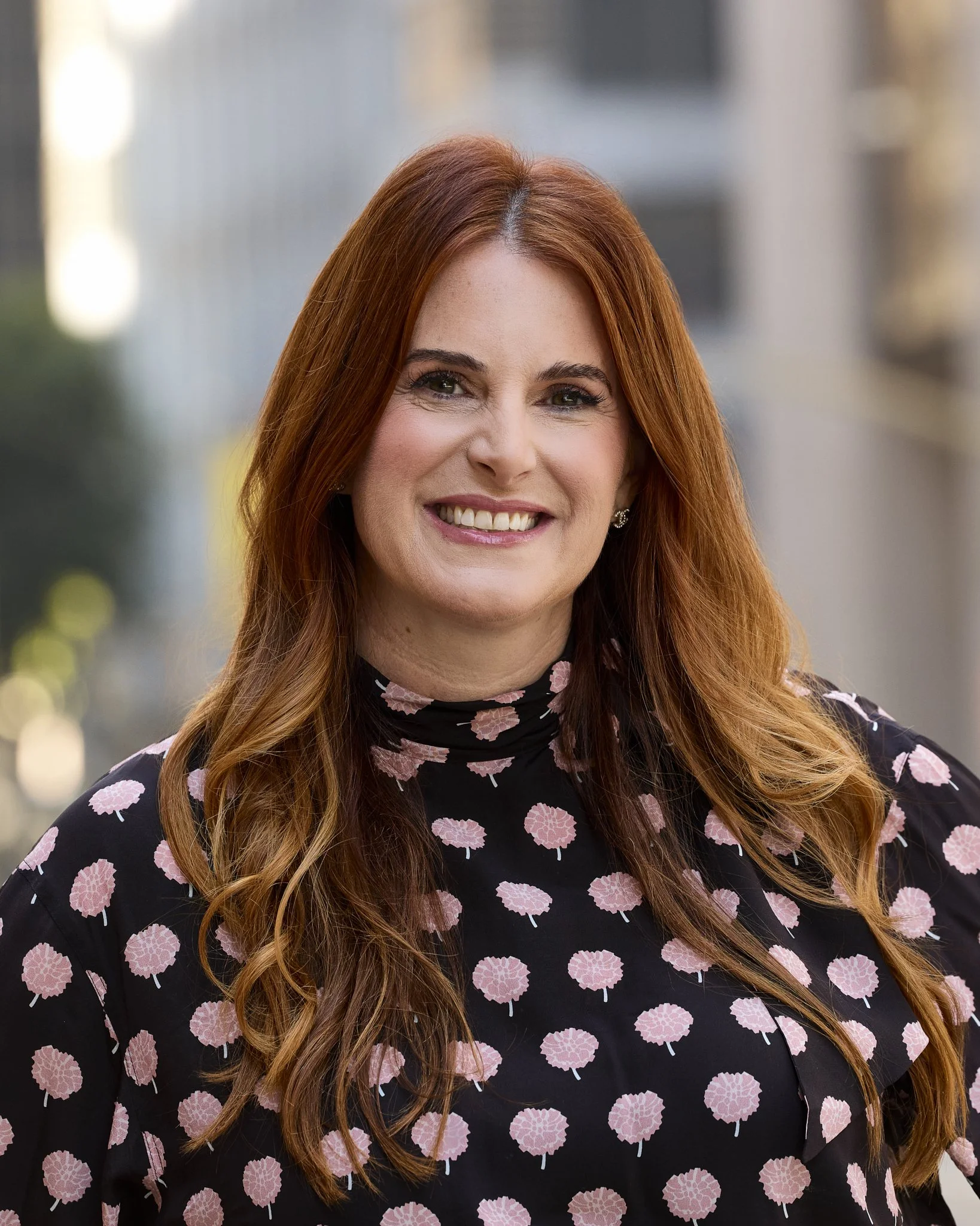 Professional headshot featuring Nicole Kuklok-Waldman in downtown Los Angeles, CA.