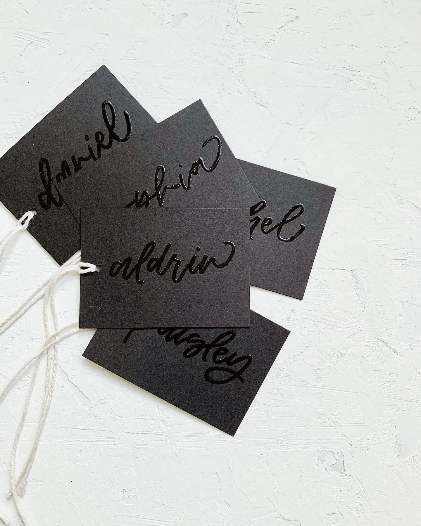 dc calligrapher - black on black hang tags for elevated gifting suites